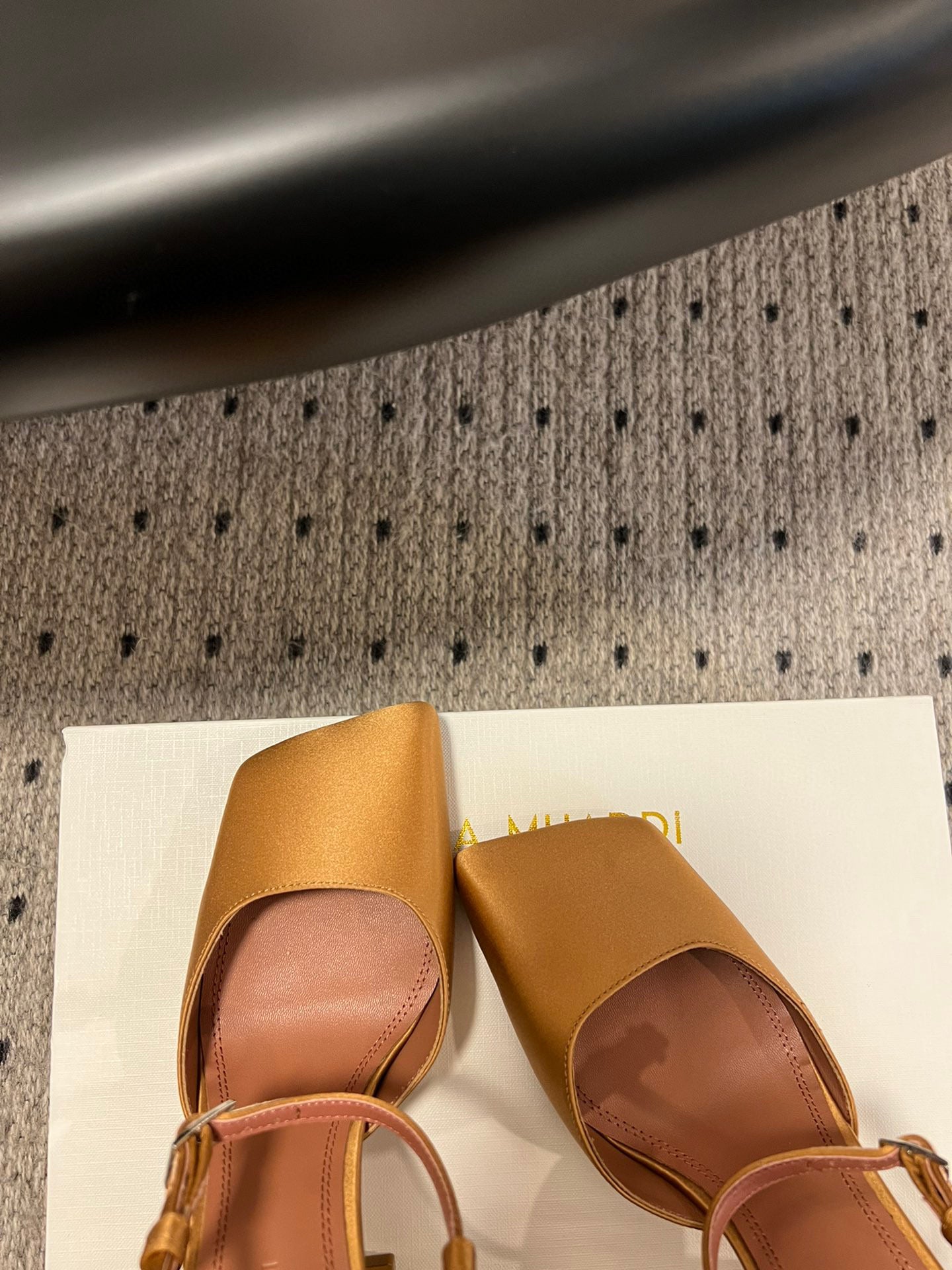 AMINA M HEELS