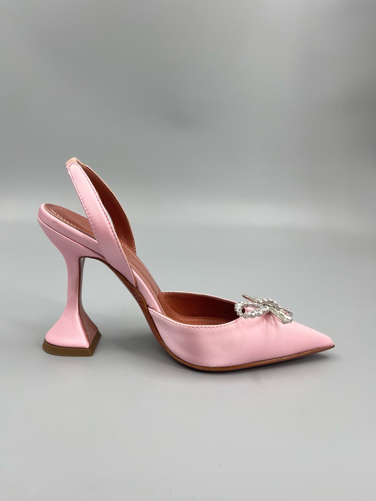 AMINA M HEELS
