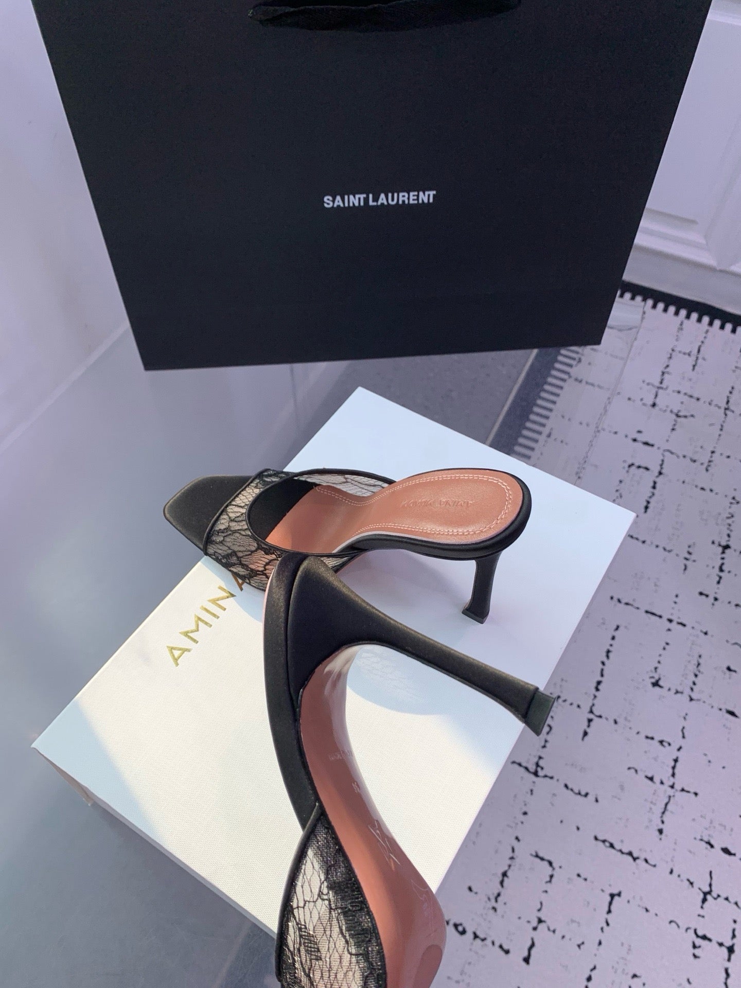 AMINA M HEELS