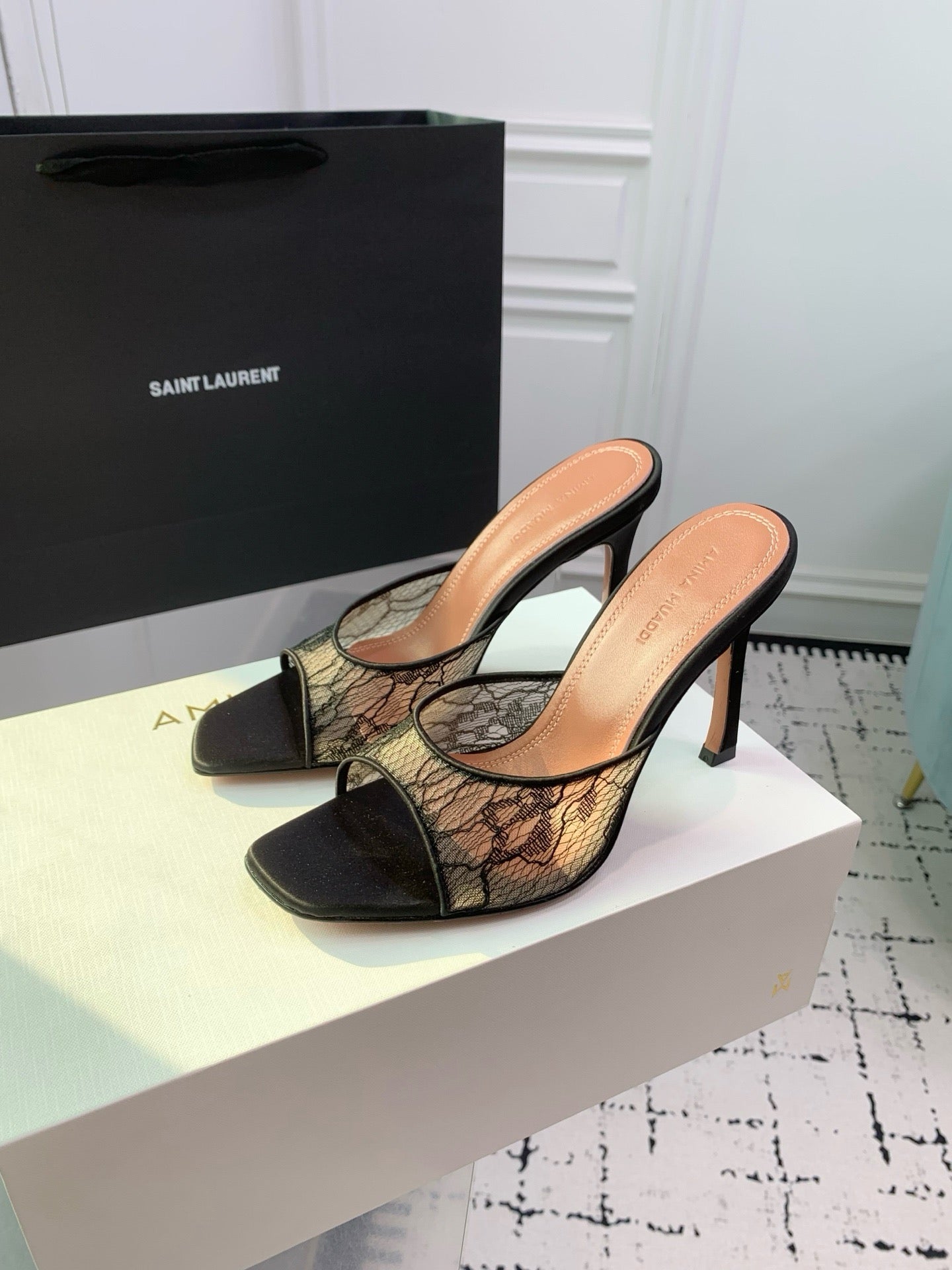 AMINA M HEELS