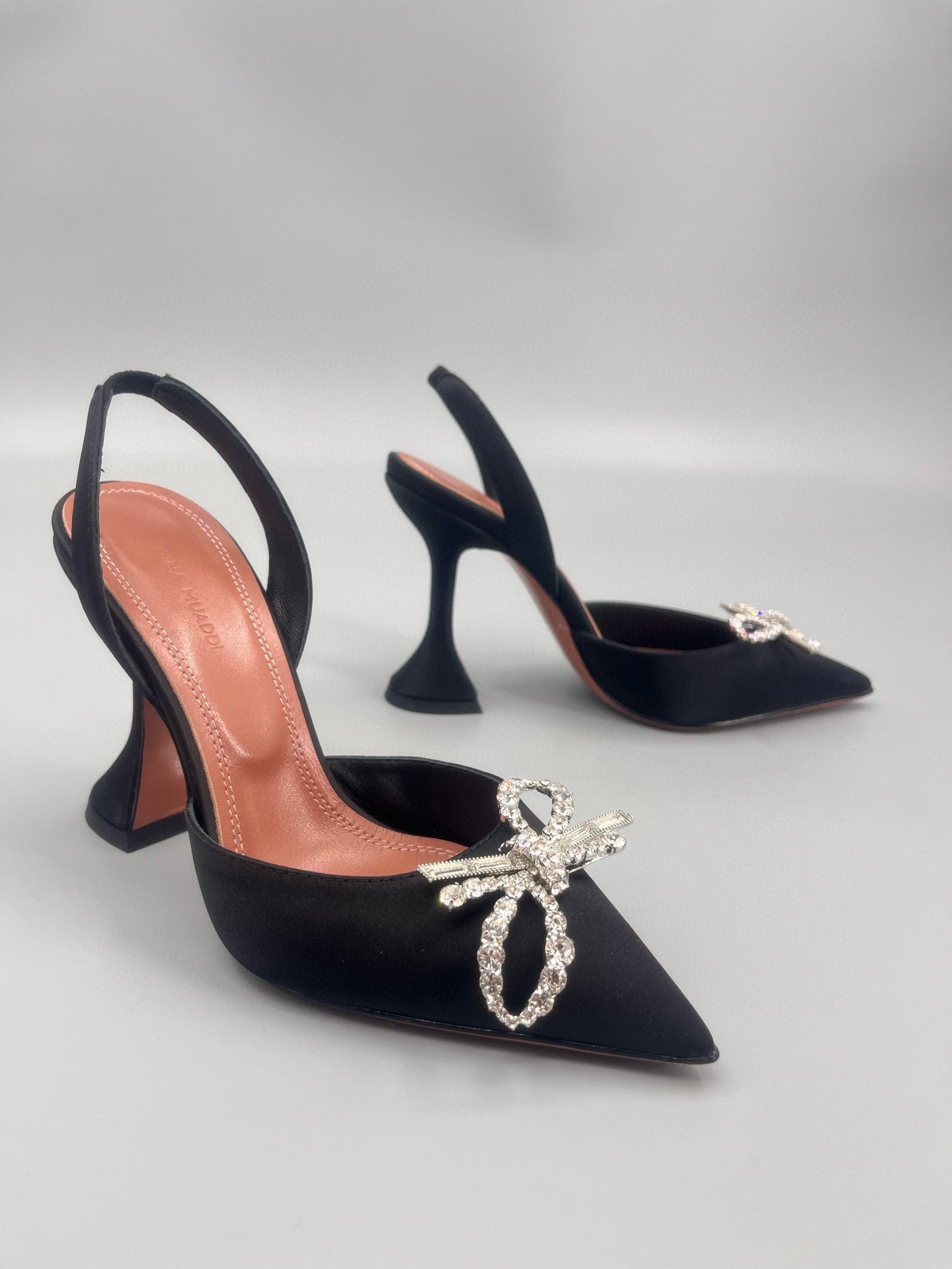 AMINA M HEELS