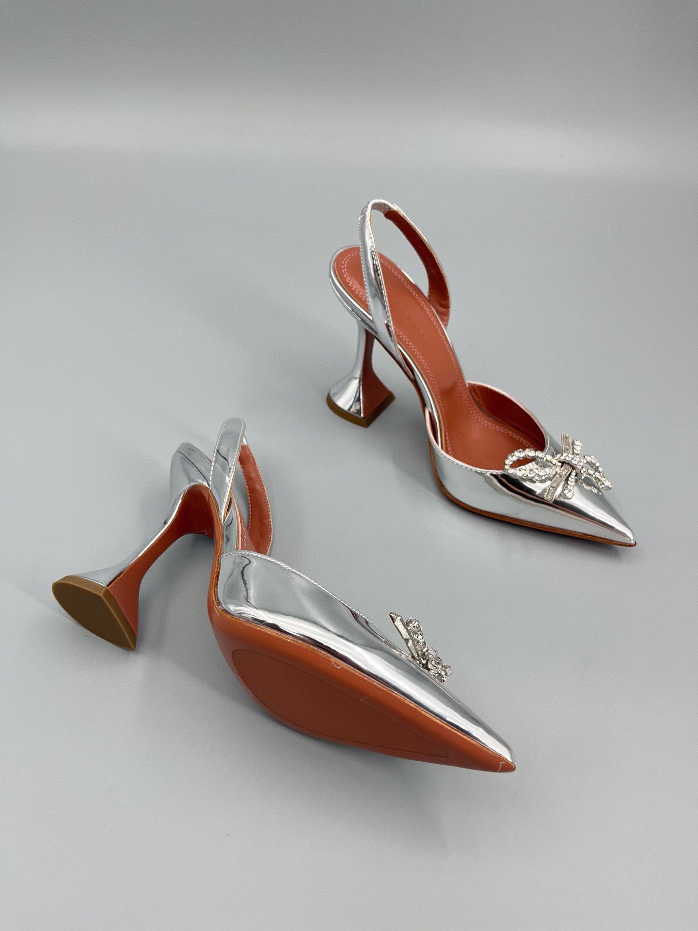 AMINA M HEELS