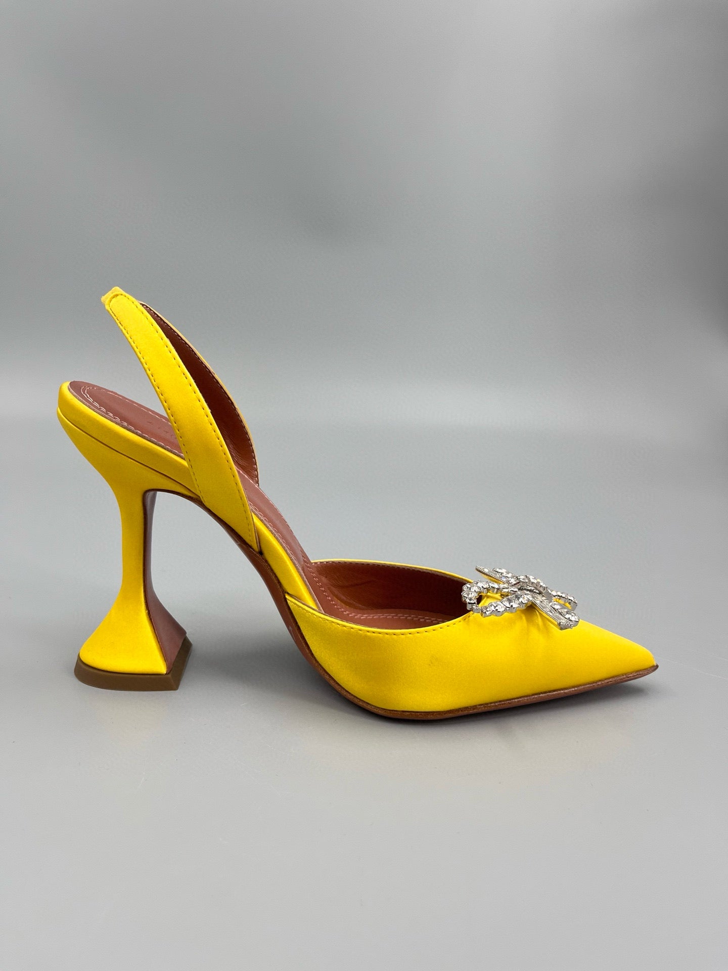 AMINA M HEELS