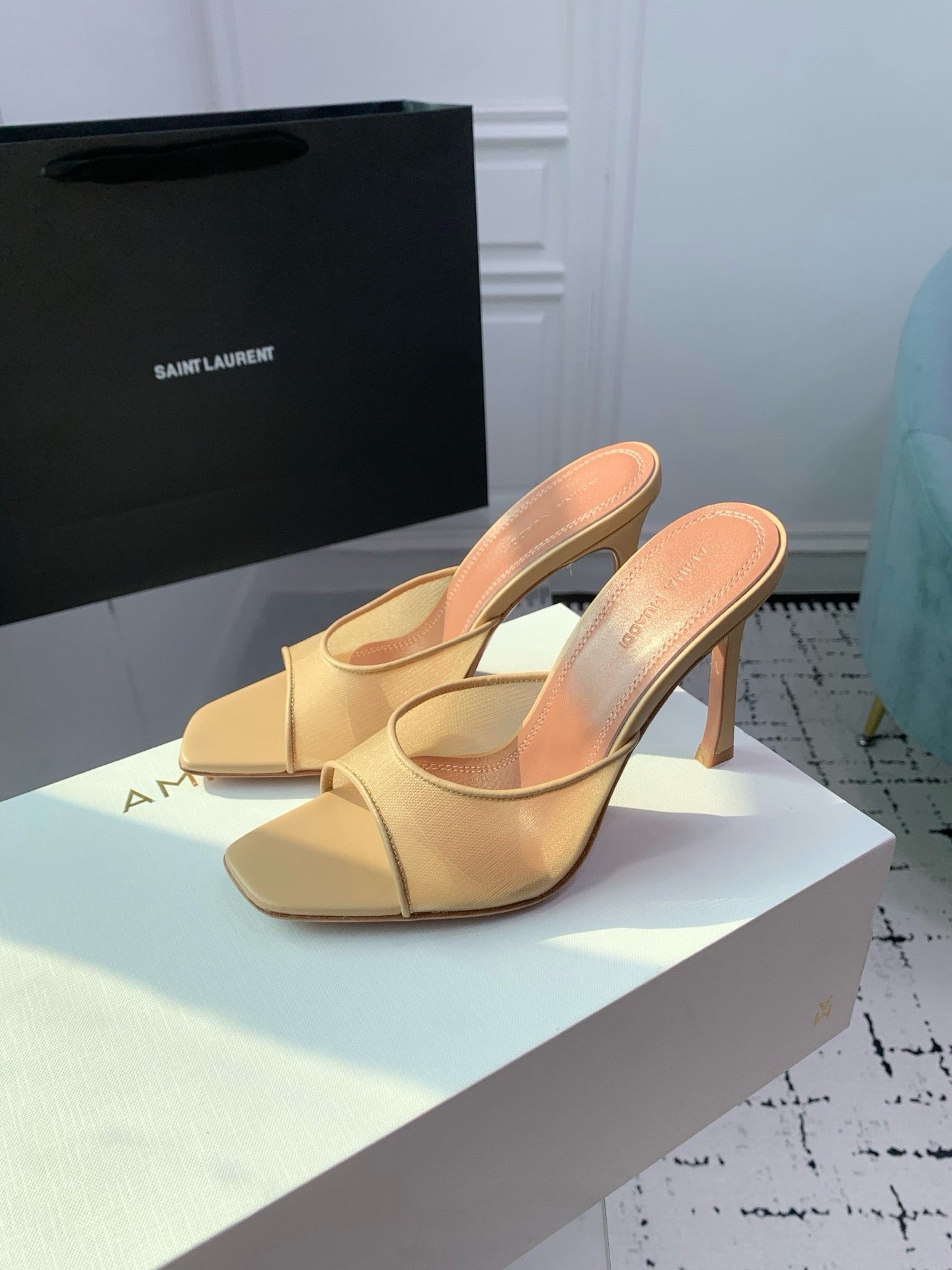 AMINA M HEELS