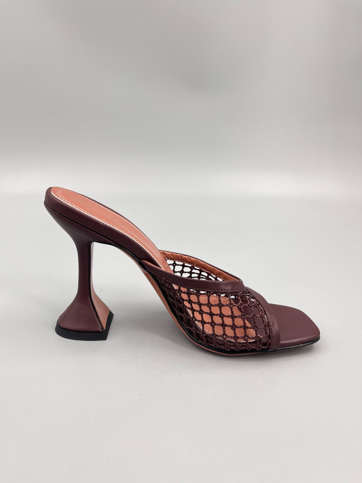 AMINA M HEELS