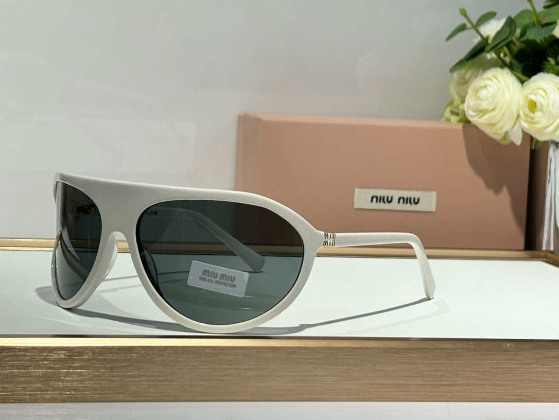 MIU M SUNGLASSES