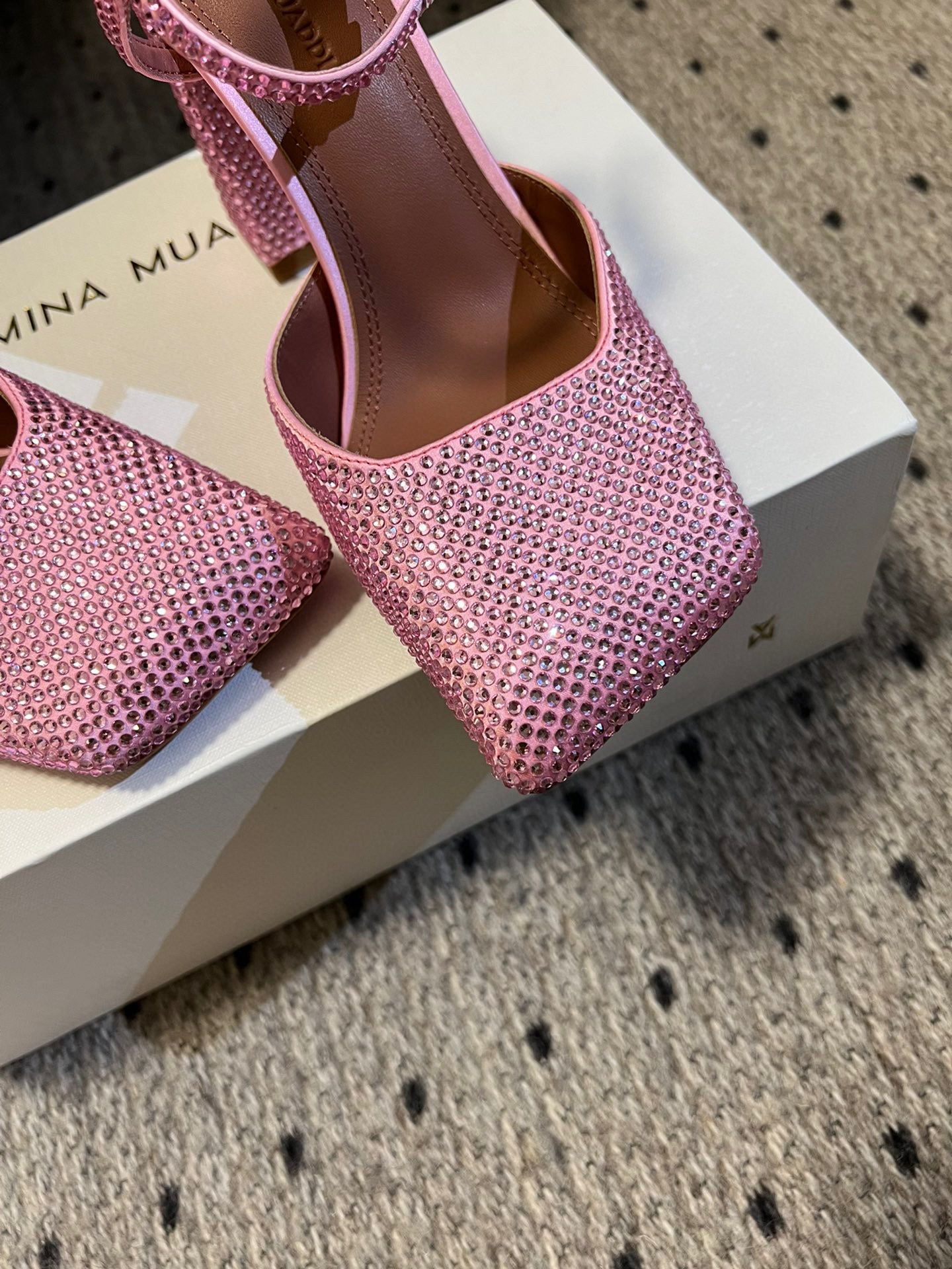 AMINA M HEELS