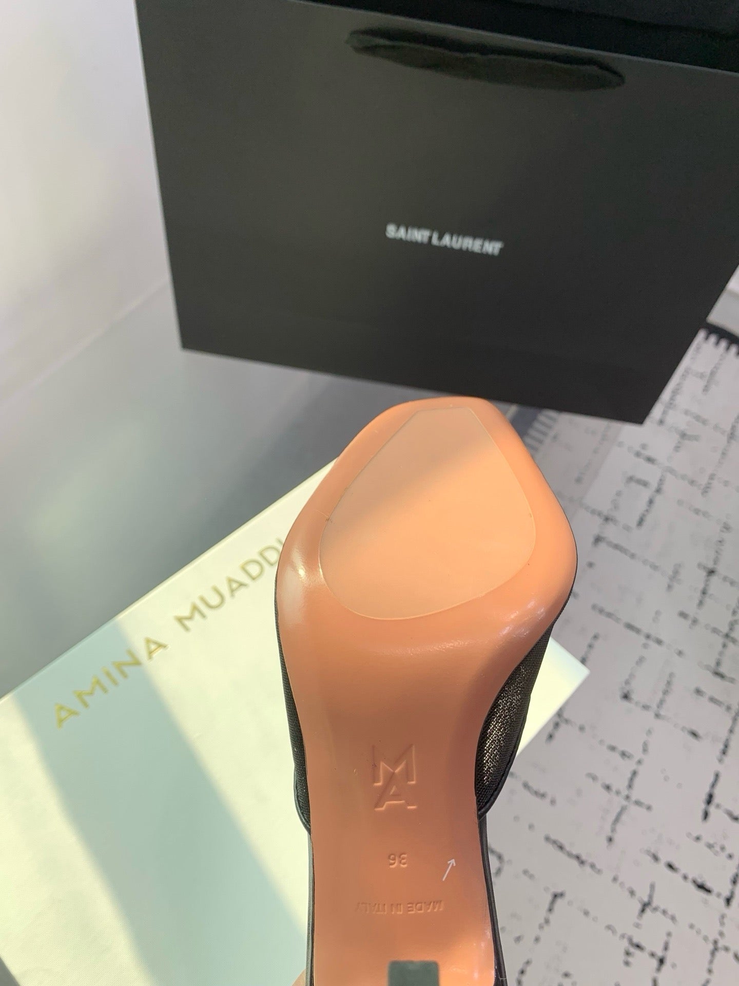 AMINA M HEELS