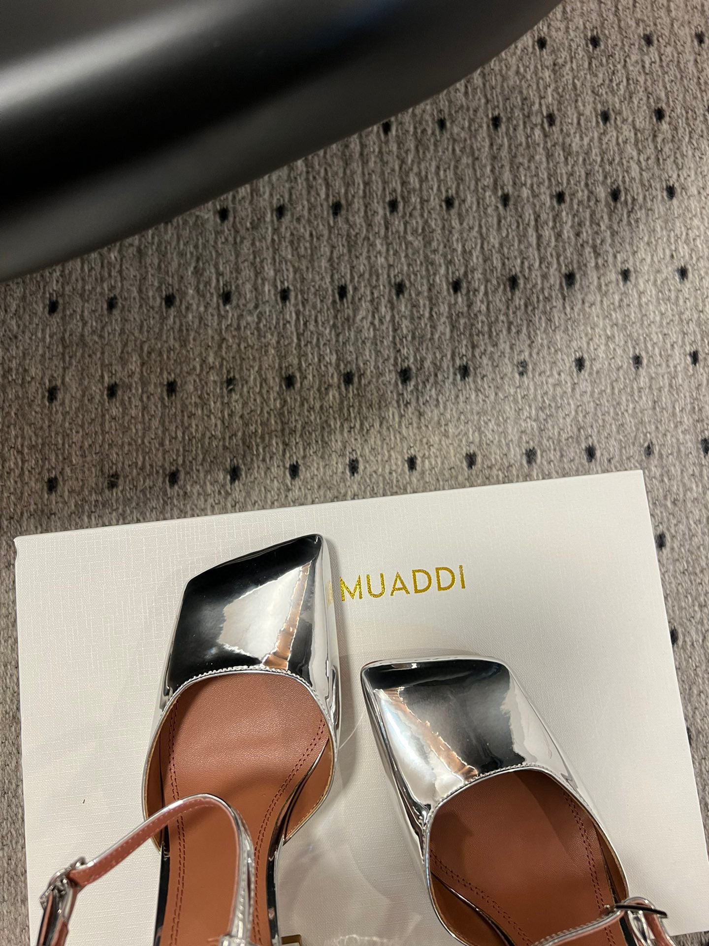 AMINA M HEELS
