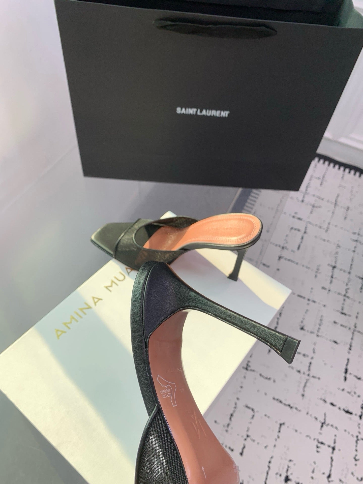 AMINA M HEELS