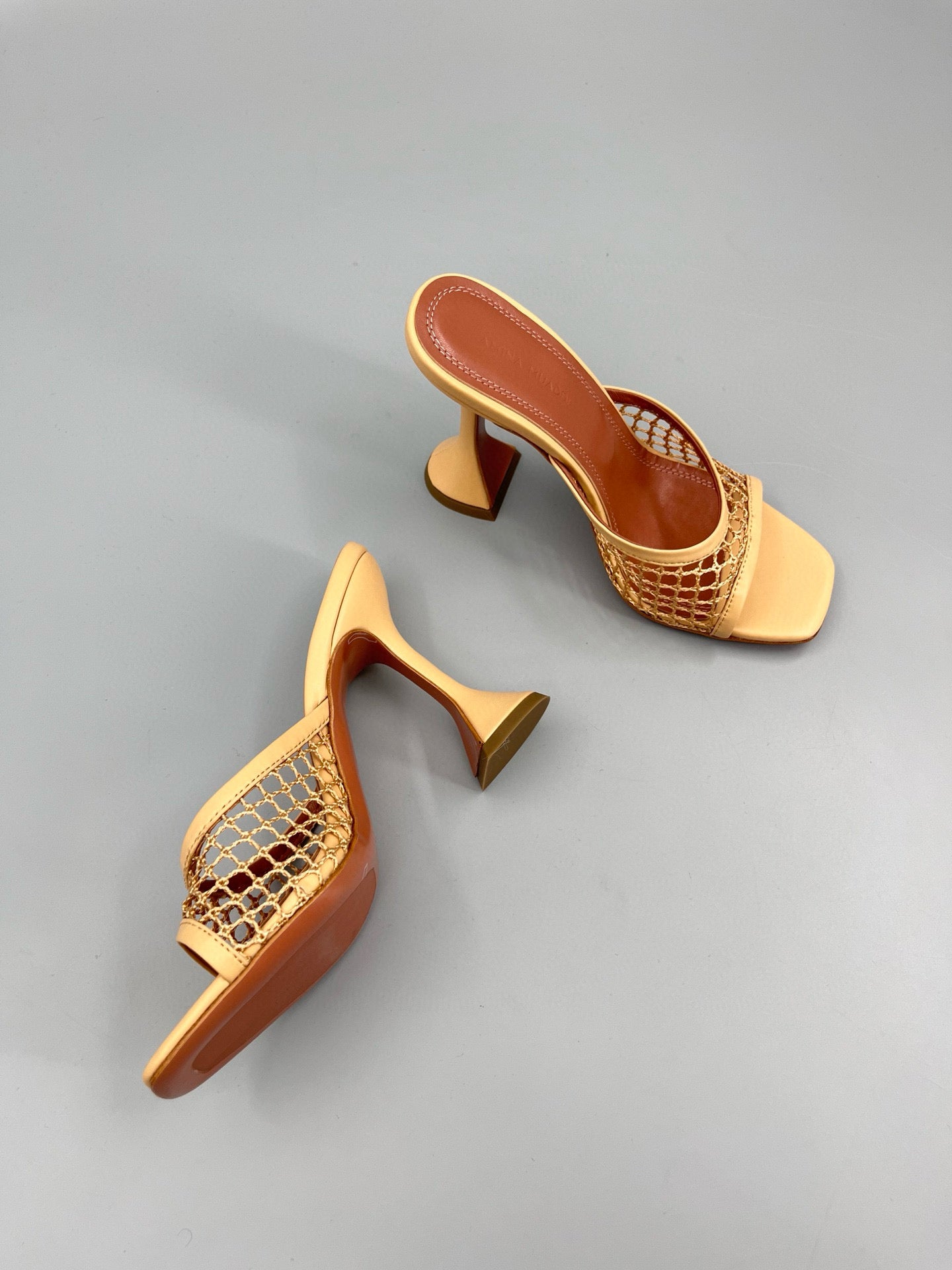 AMINA M HEELS