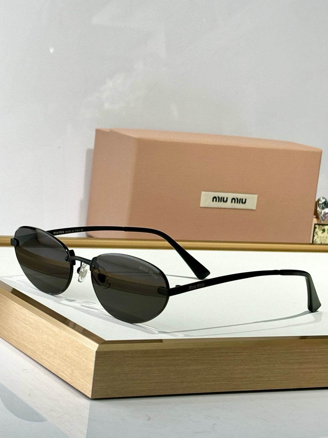 MIU M SUNGLASSES