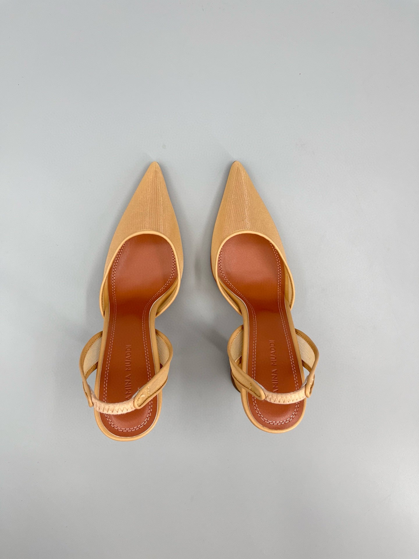 AMINA M HEELS