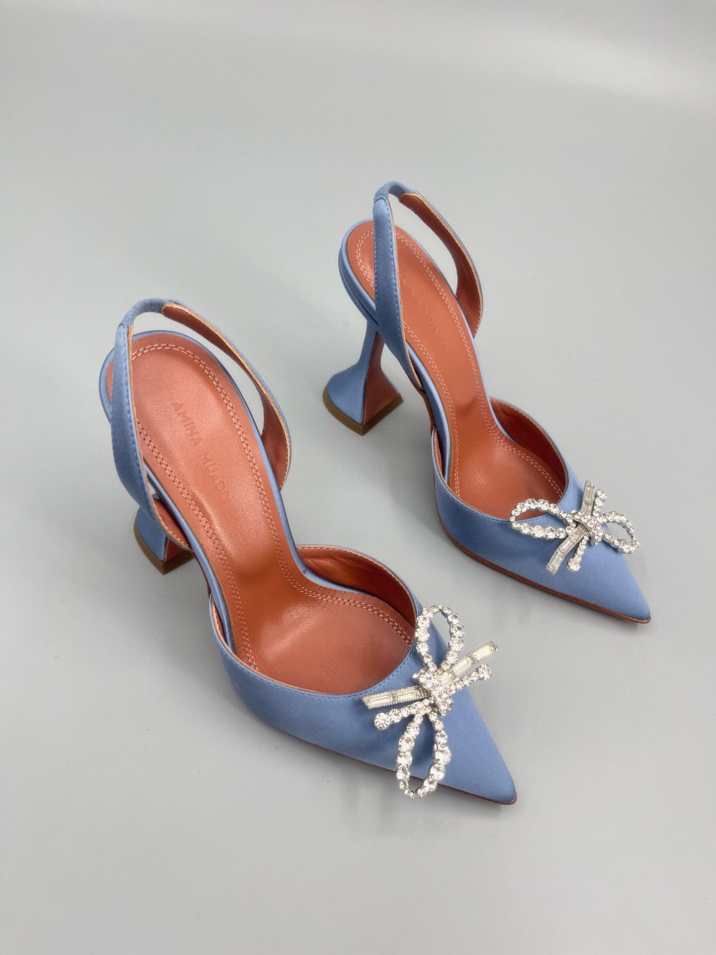 AMINA M HEELS