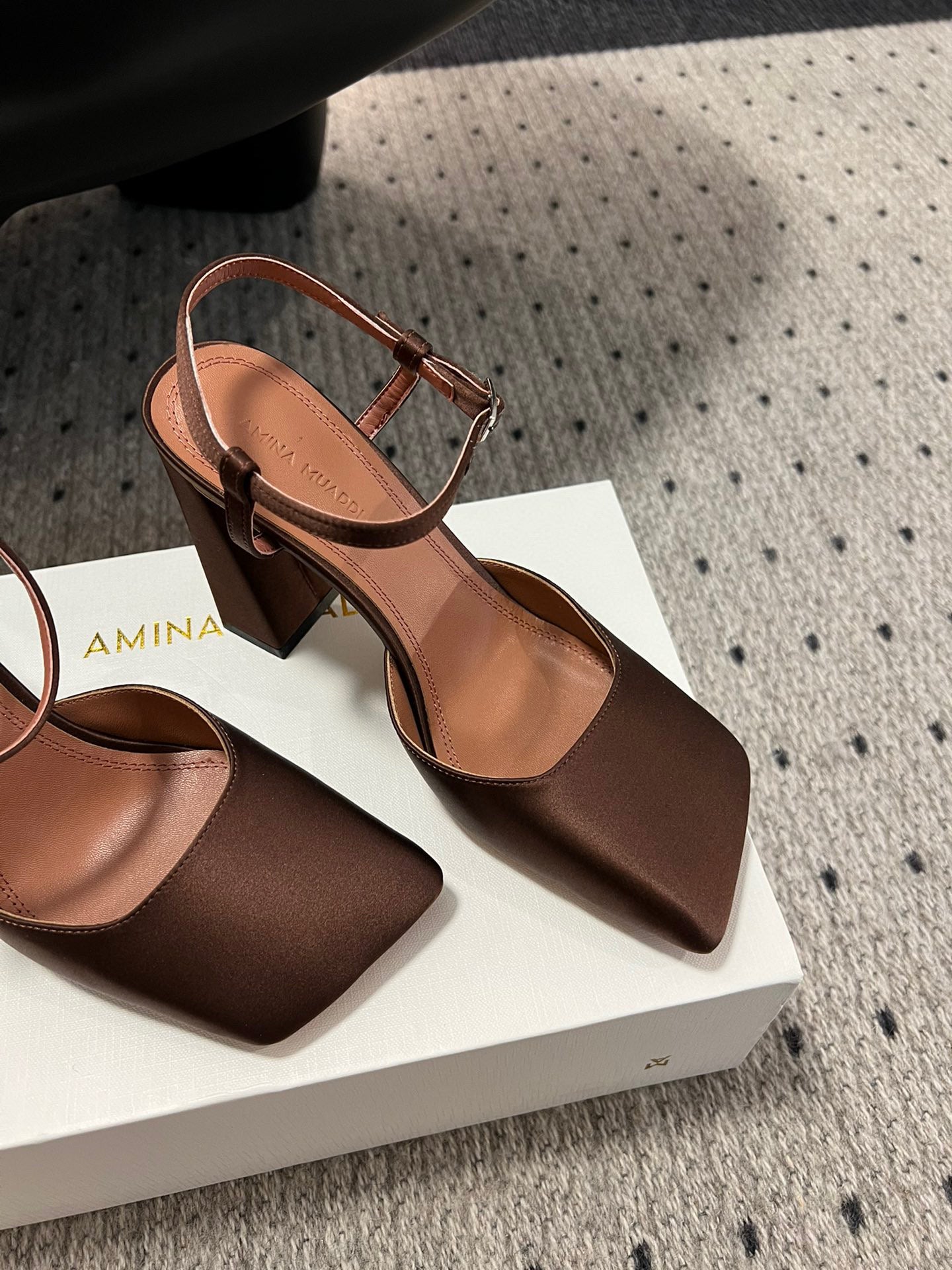 AMINA M HEELS