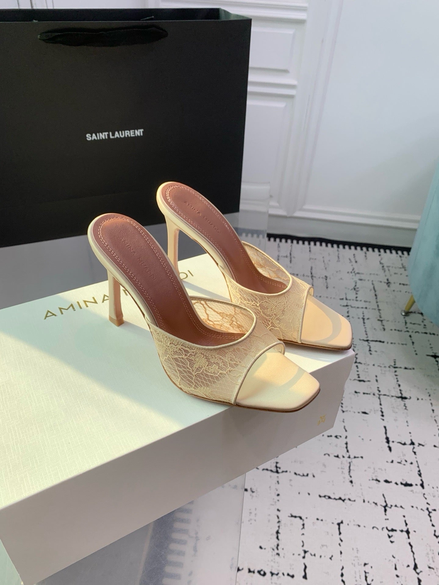 AMINA M HEELS
