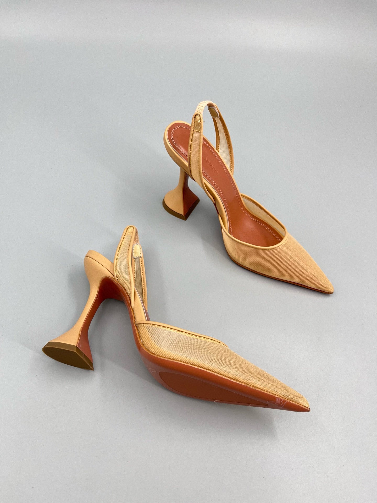 AMINA M HEELS