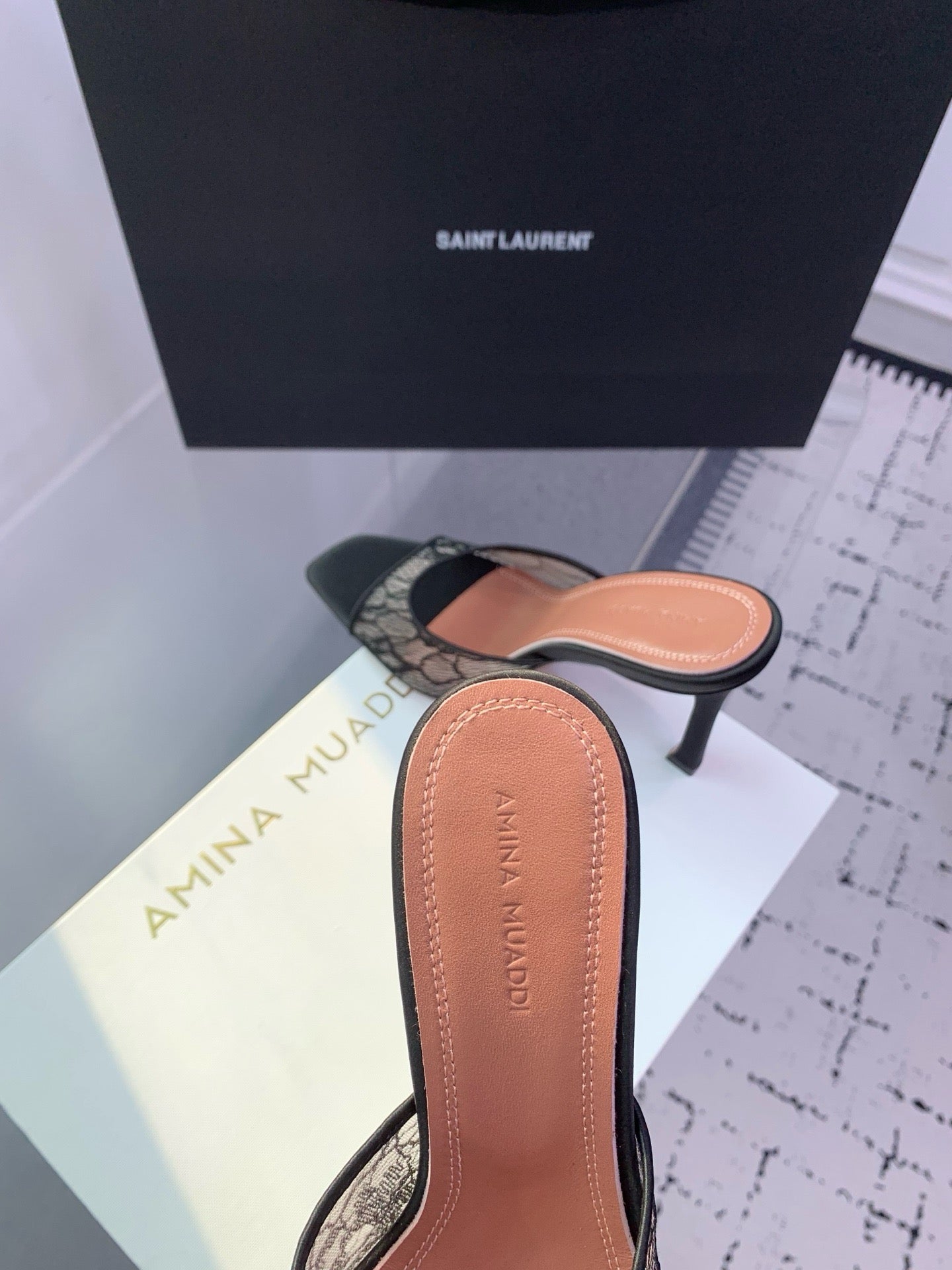AMINA M HEELS