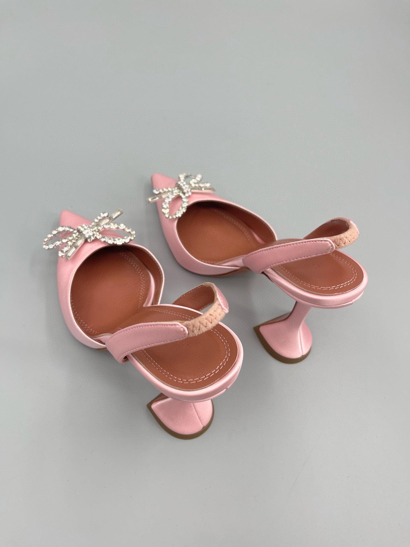 AMINA M HEELS