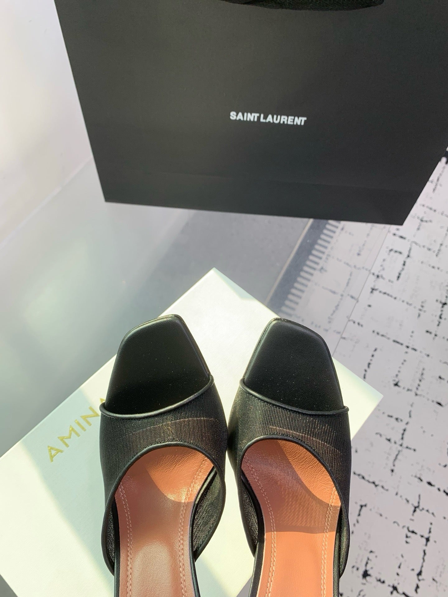 AMINA M HEELS