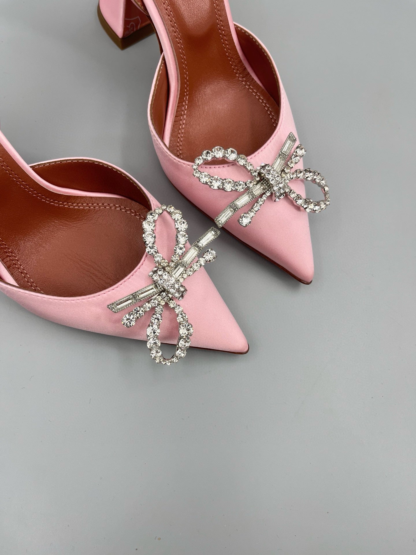 AMINA M HEELS