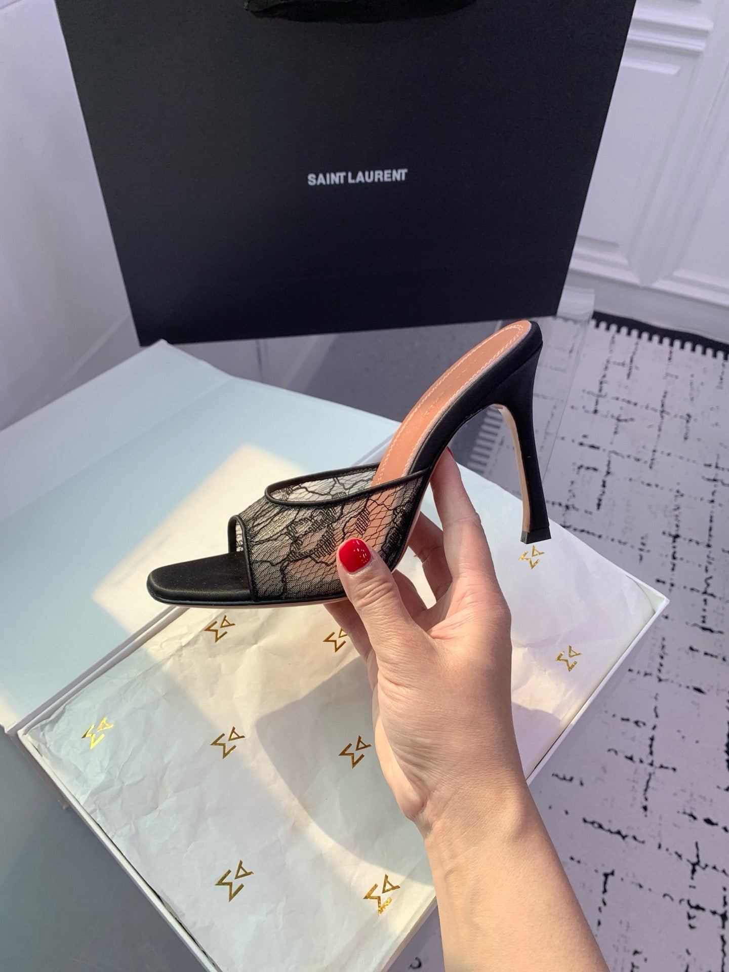 AMINA M HEELS