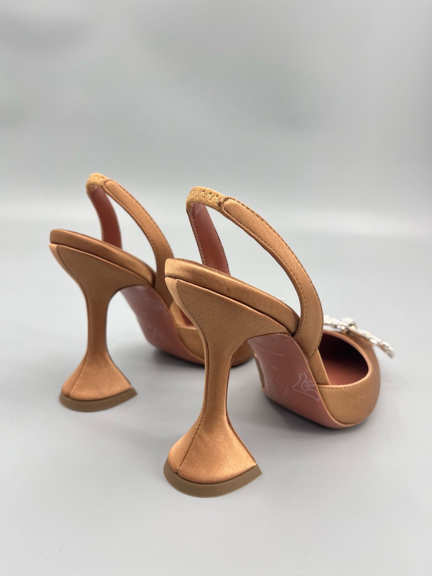 AMINA M HEELS