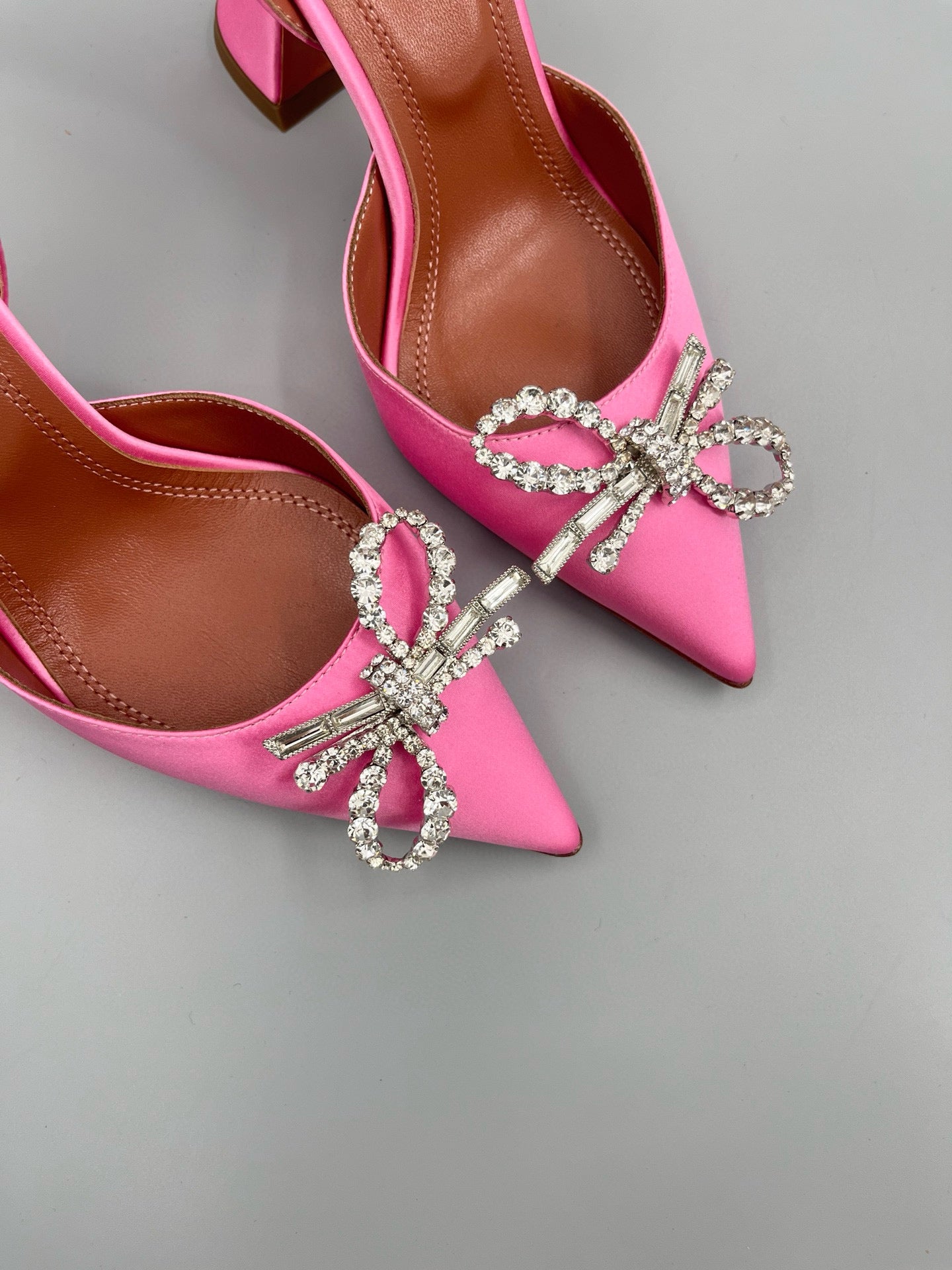 AMINA M HEELS