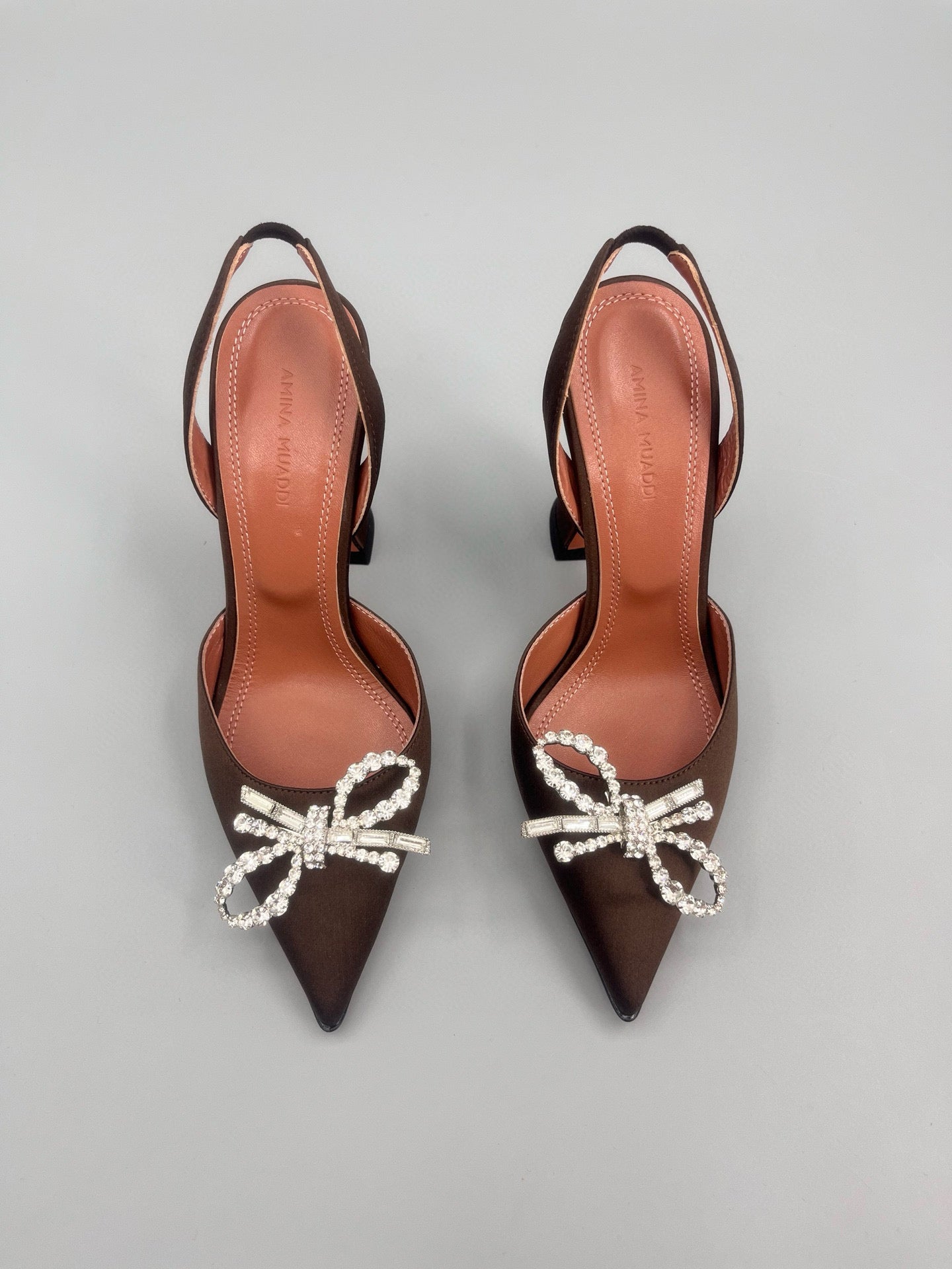 AMINA M HEELS