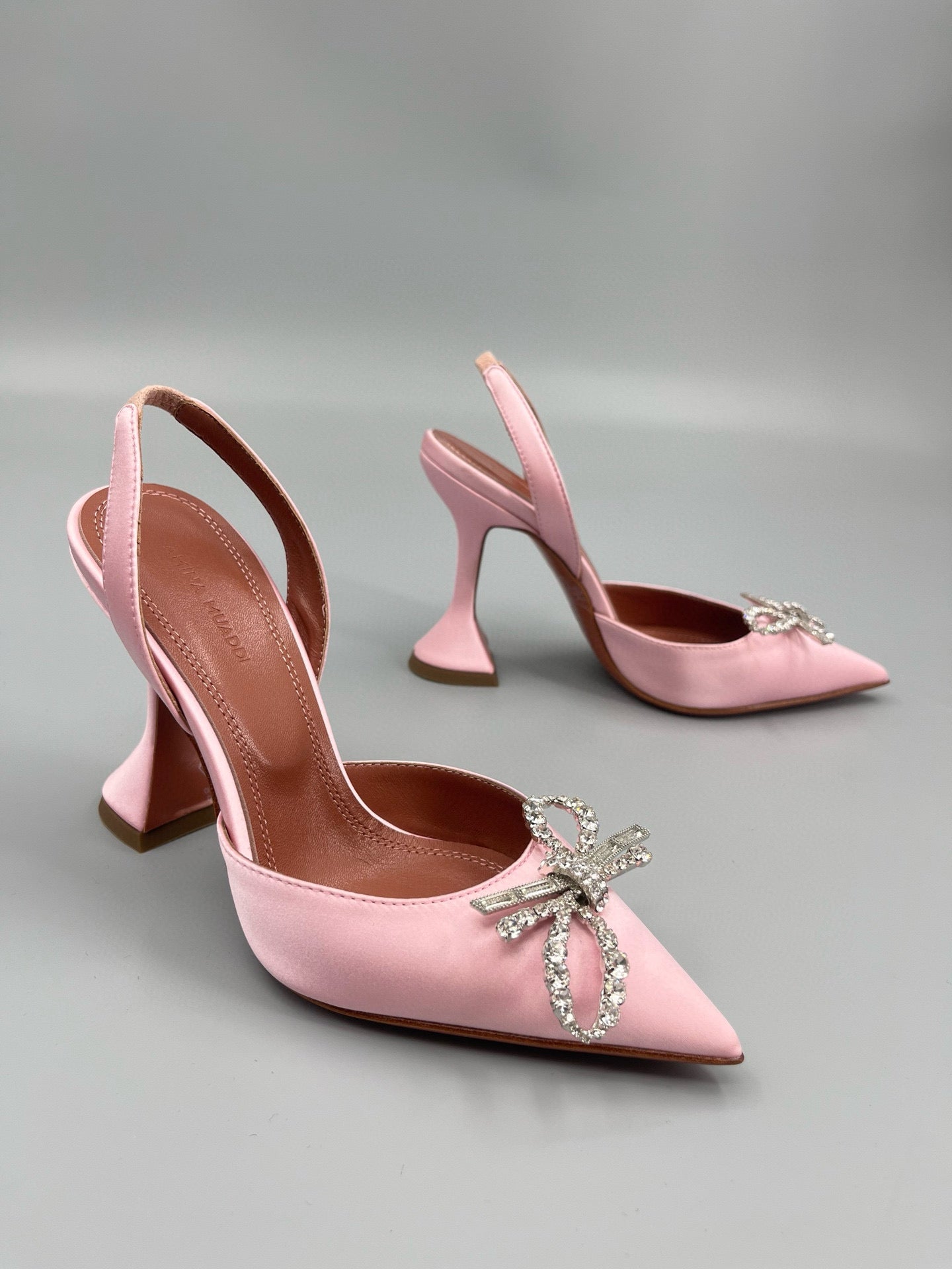 AMINA M HEELS