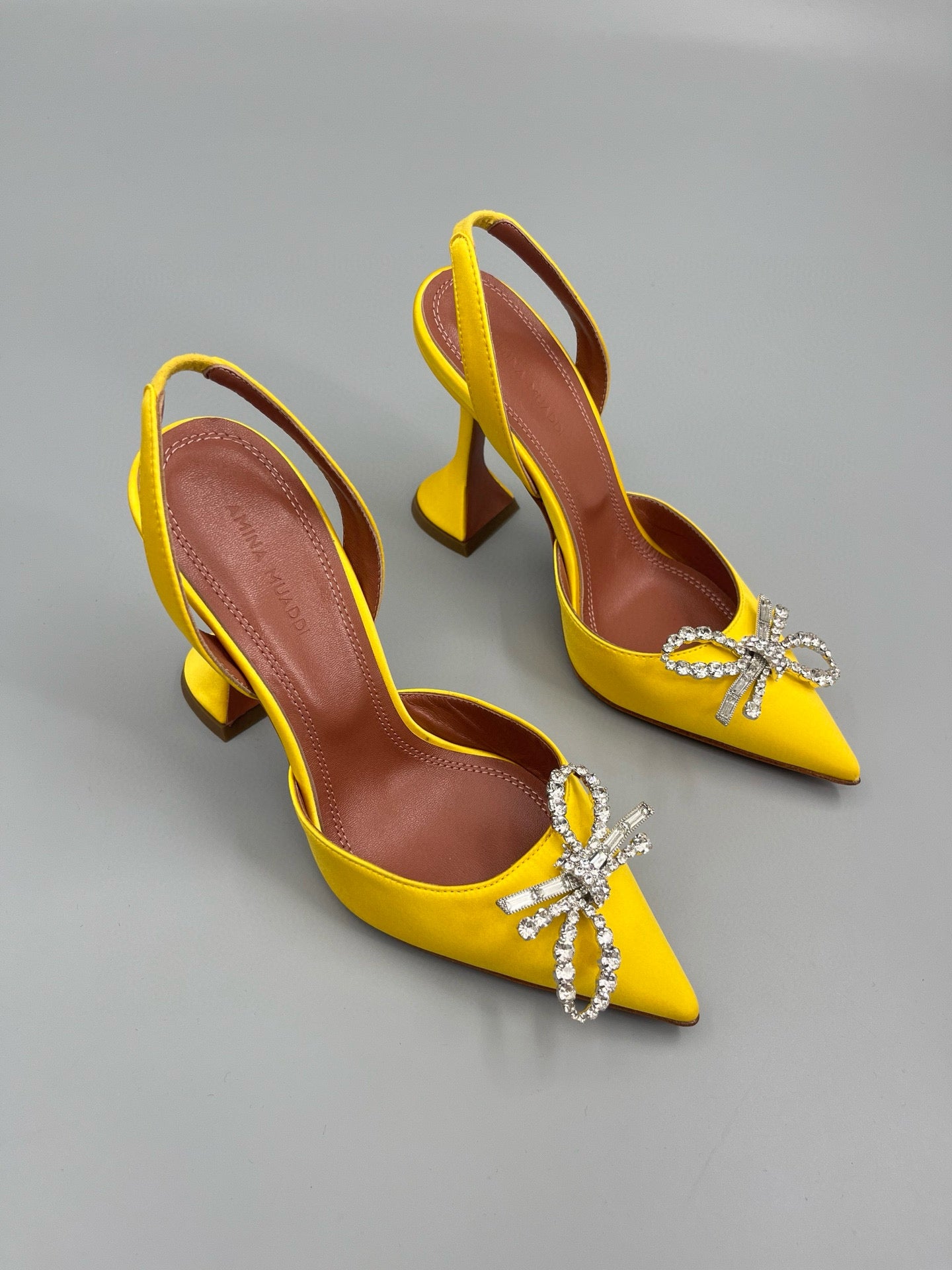 AMINA M HEELS