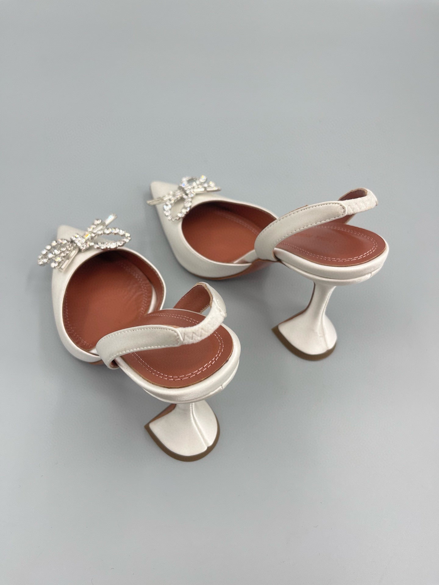 AMINA M HEELS