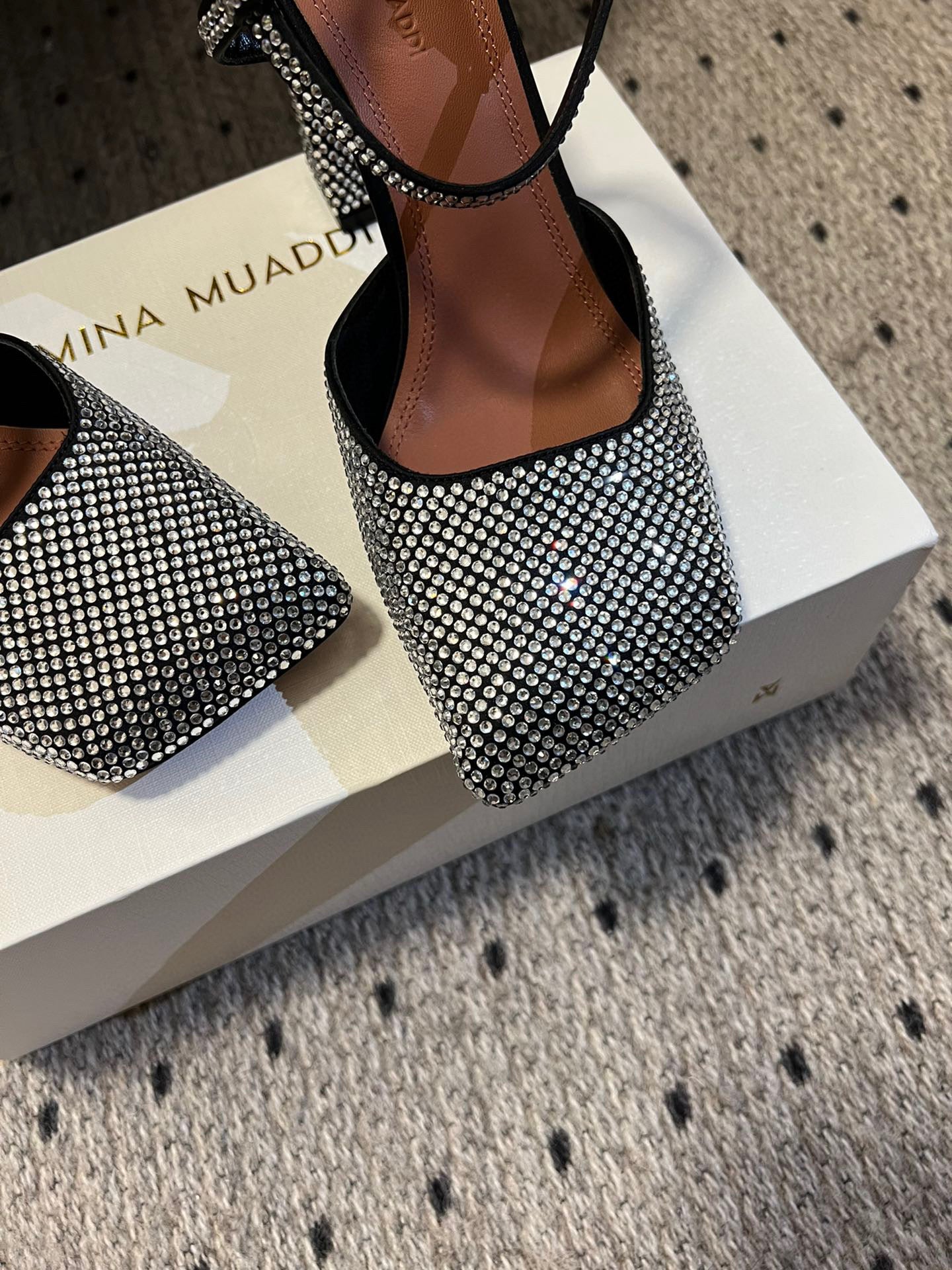 AMINA M HEELS