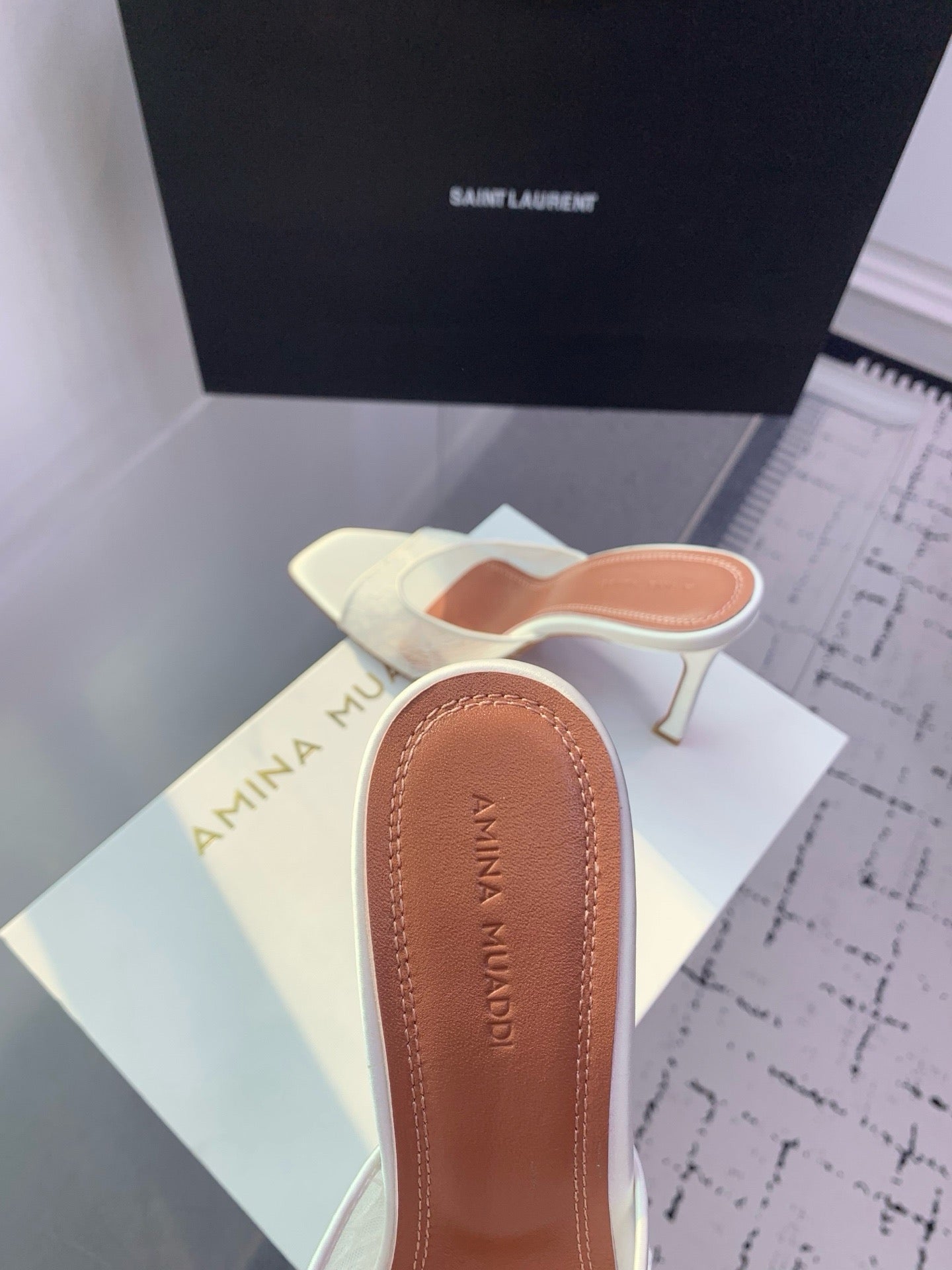 AMINA M HEELS
