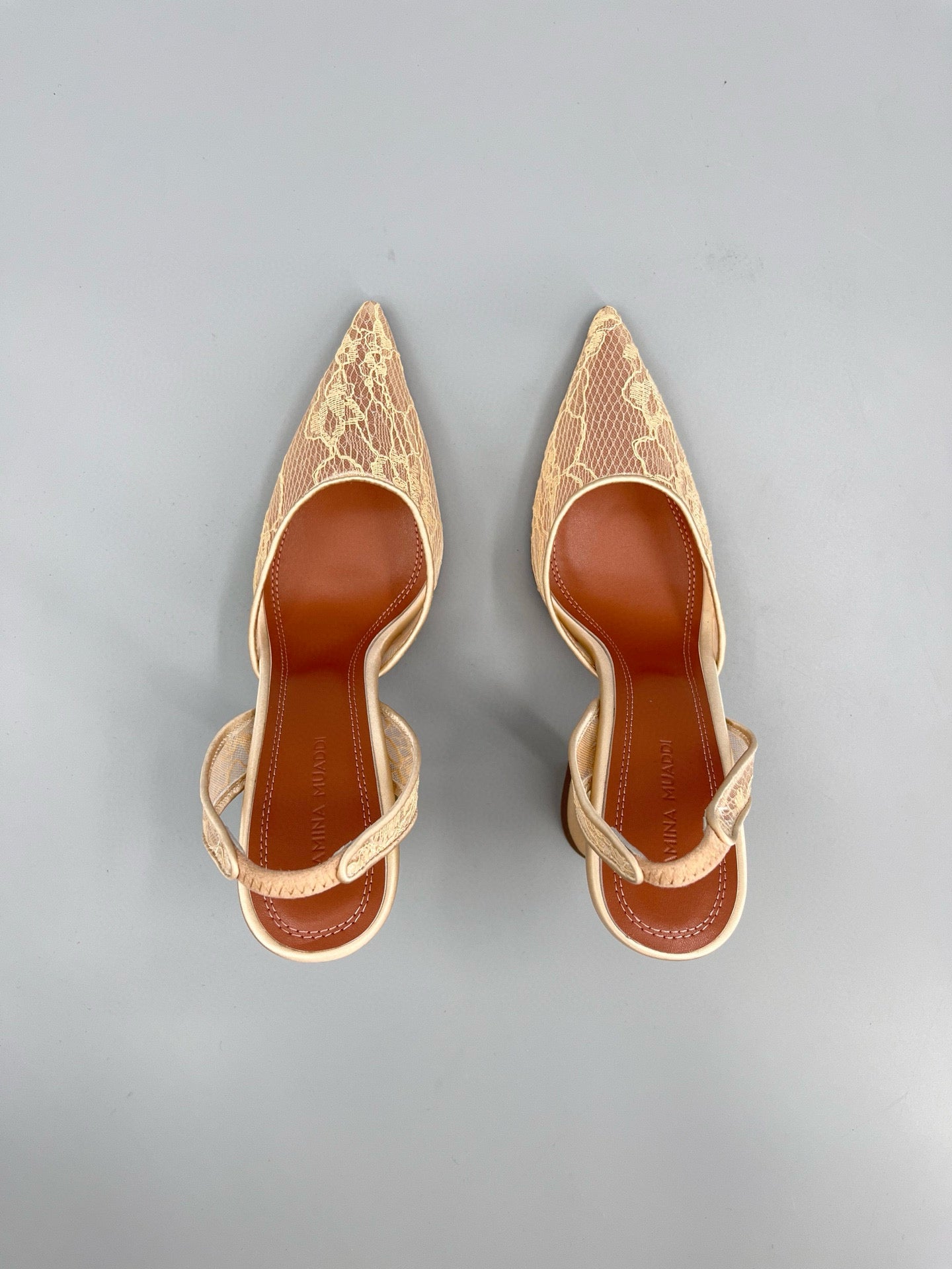 AMINA M HEELS