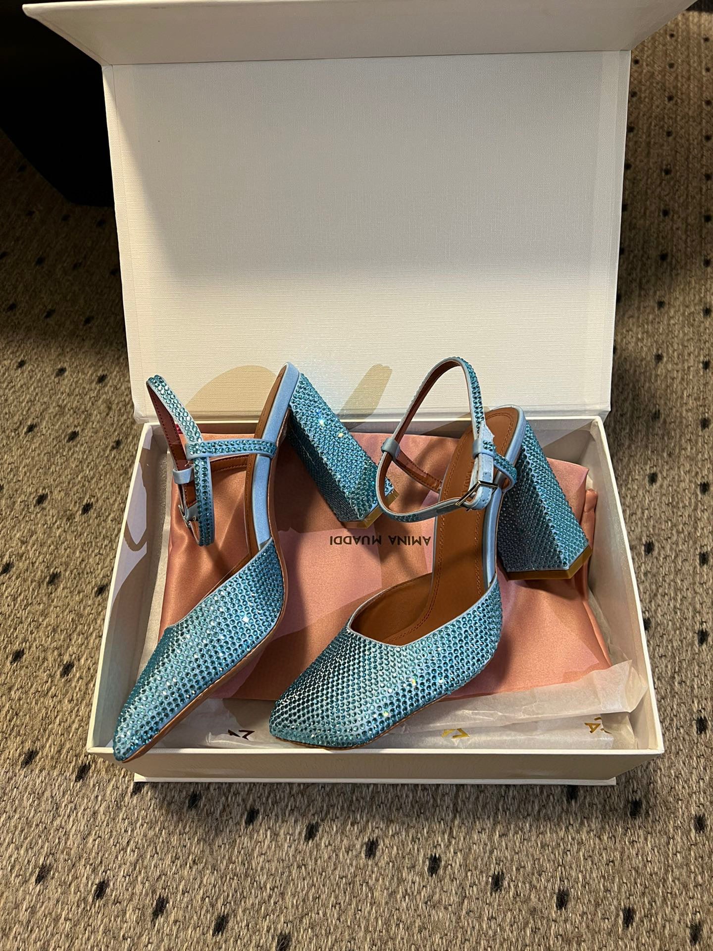 AMINA M HEELS