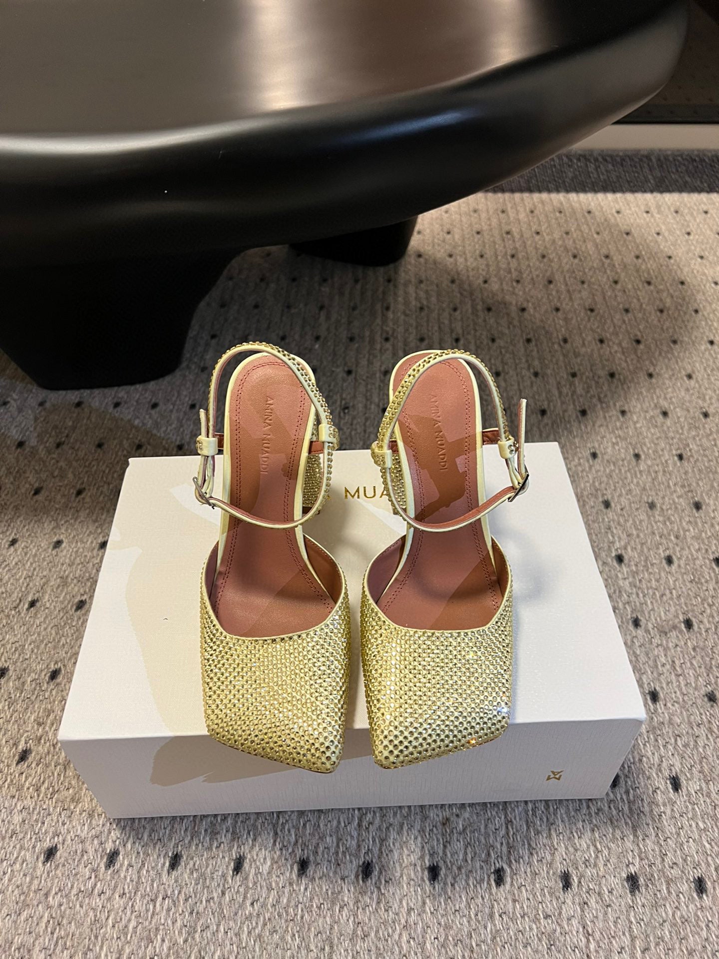 AMINA M HEELS
