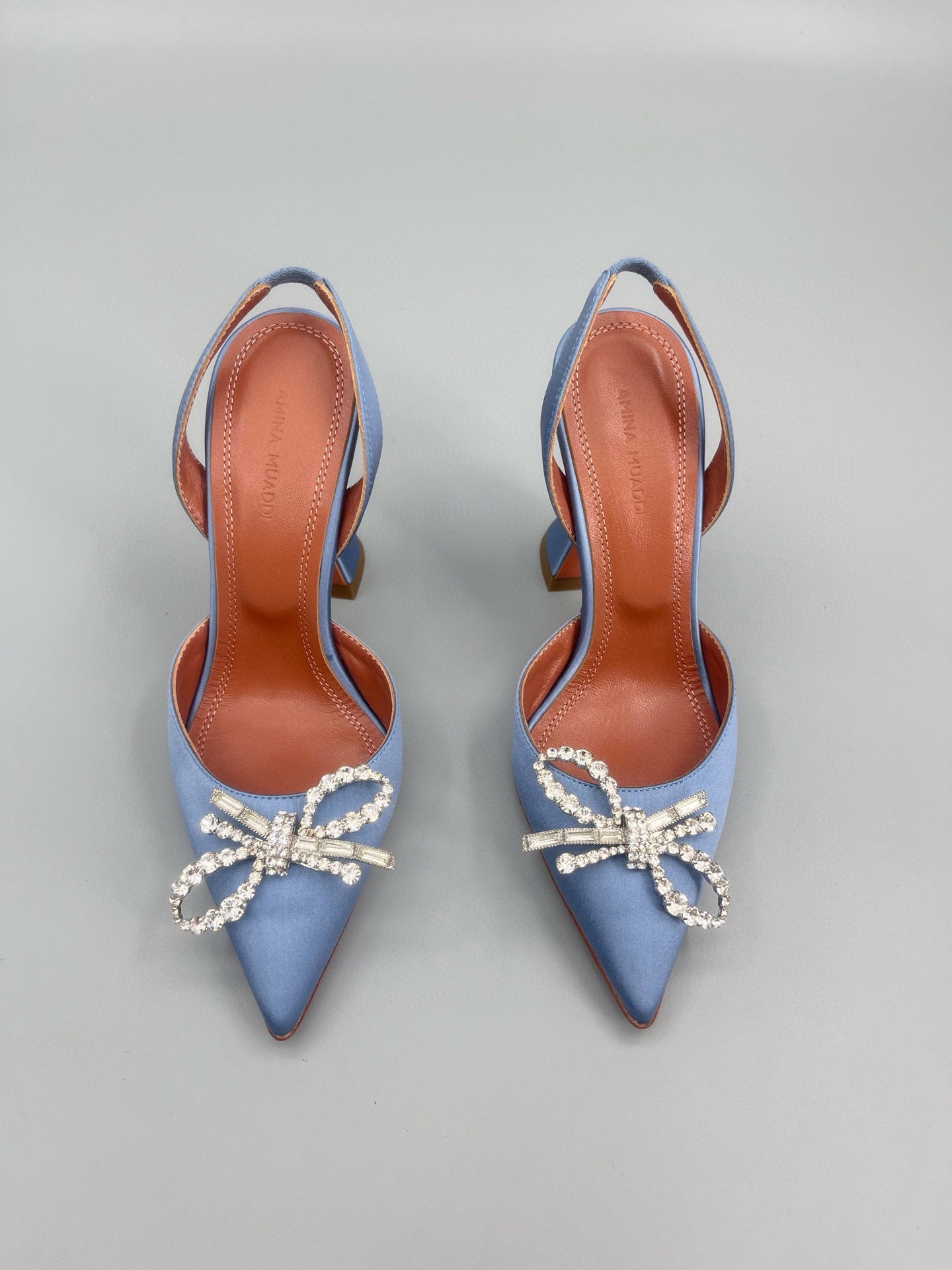AMINA M HEELS