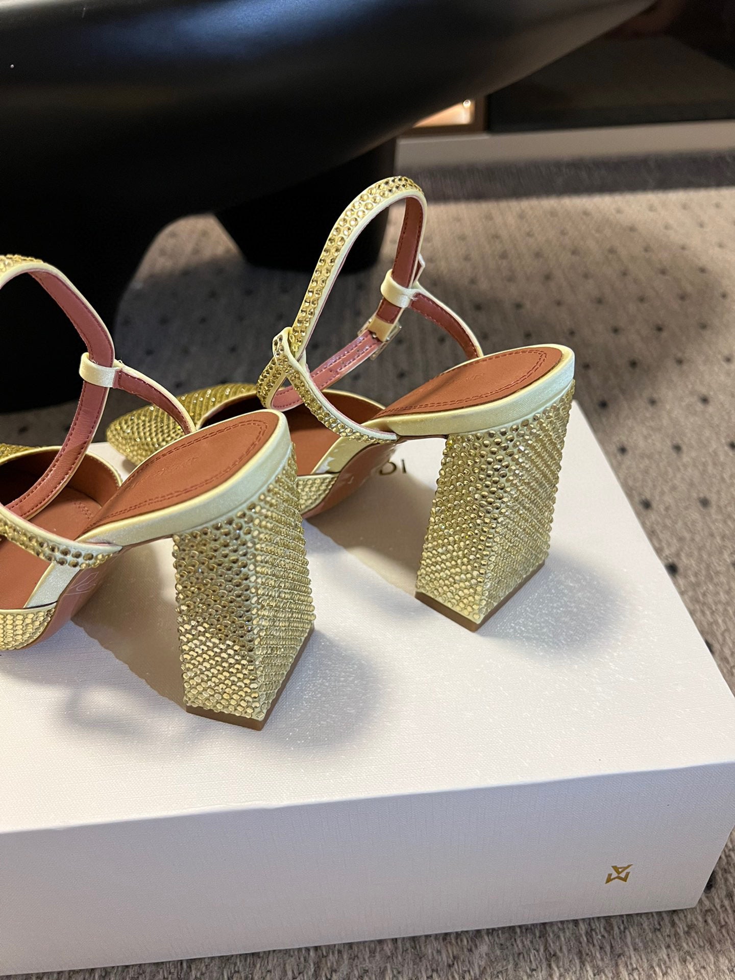 AMINA M HEELS