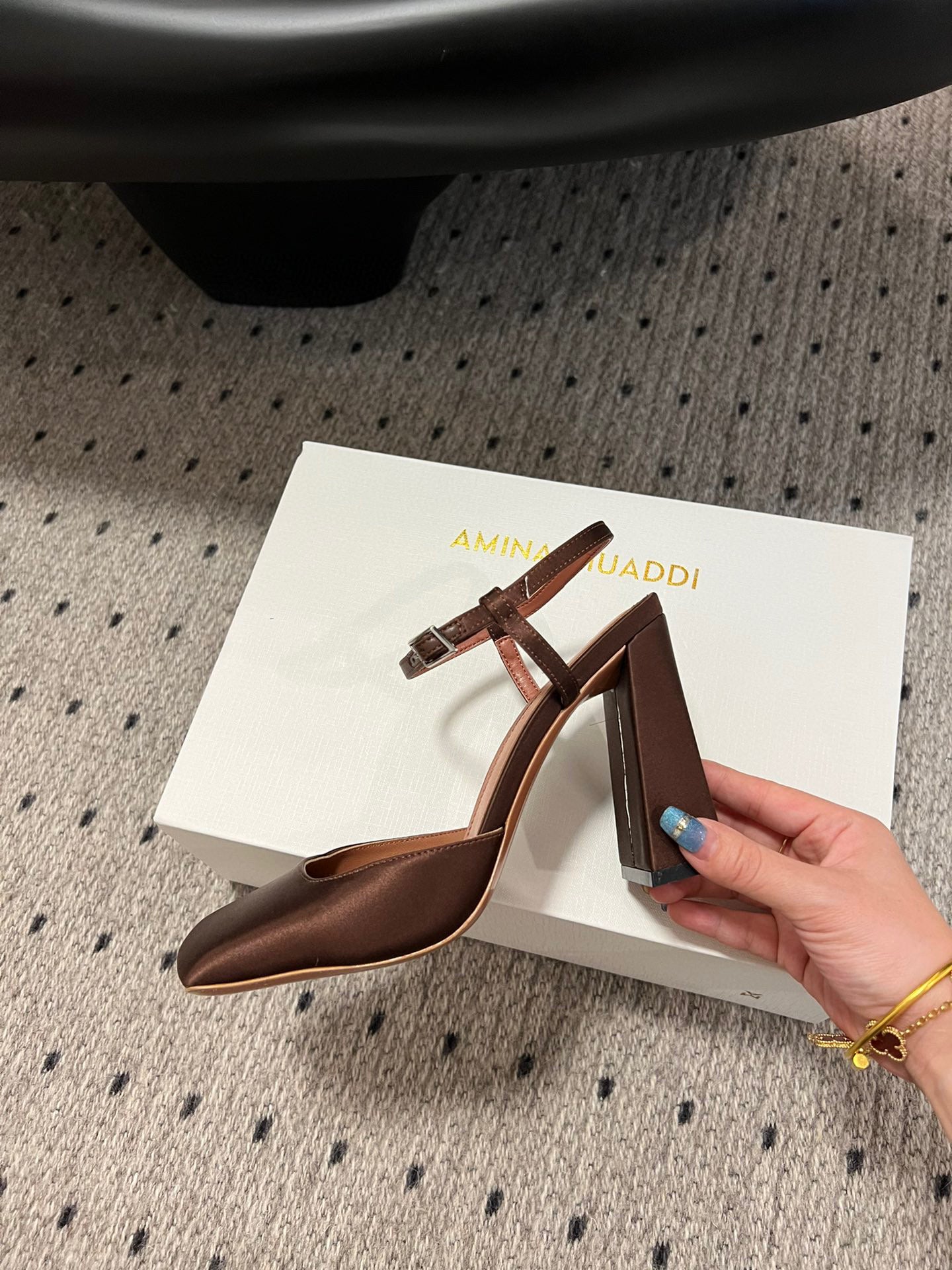 AMINA M HEELS