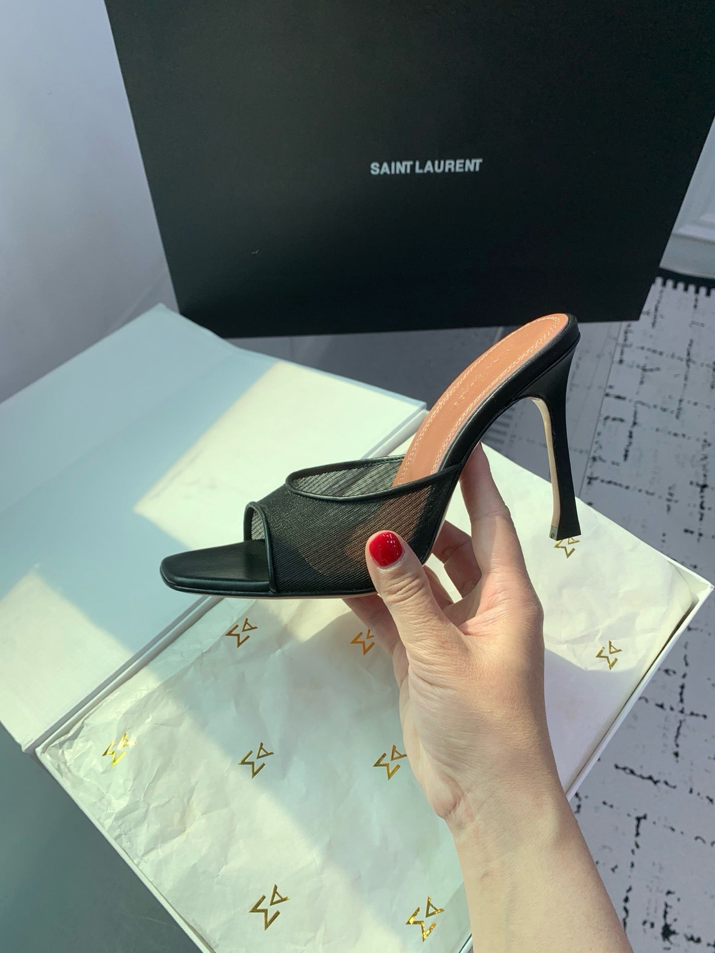 AMINA M HEELS