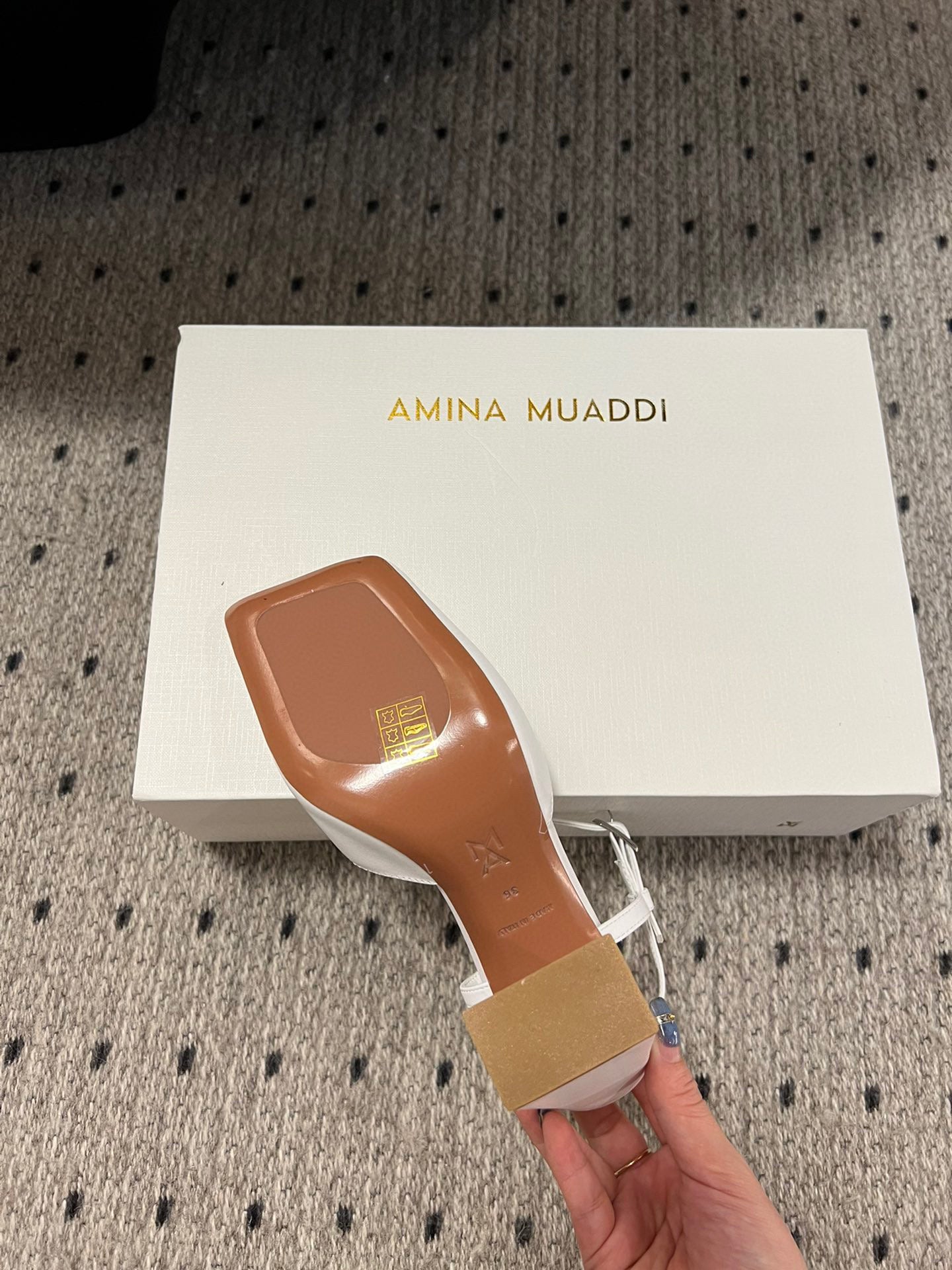 AMINA M HEELS