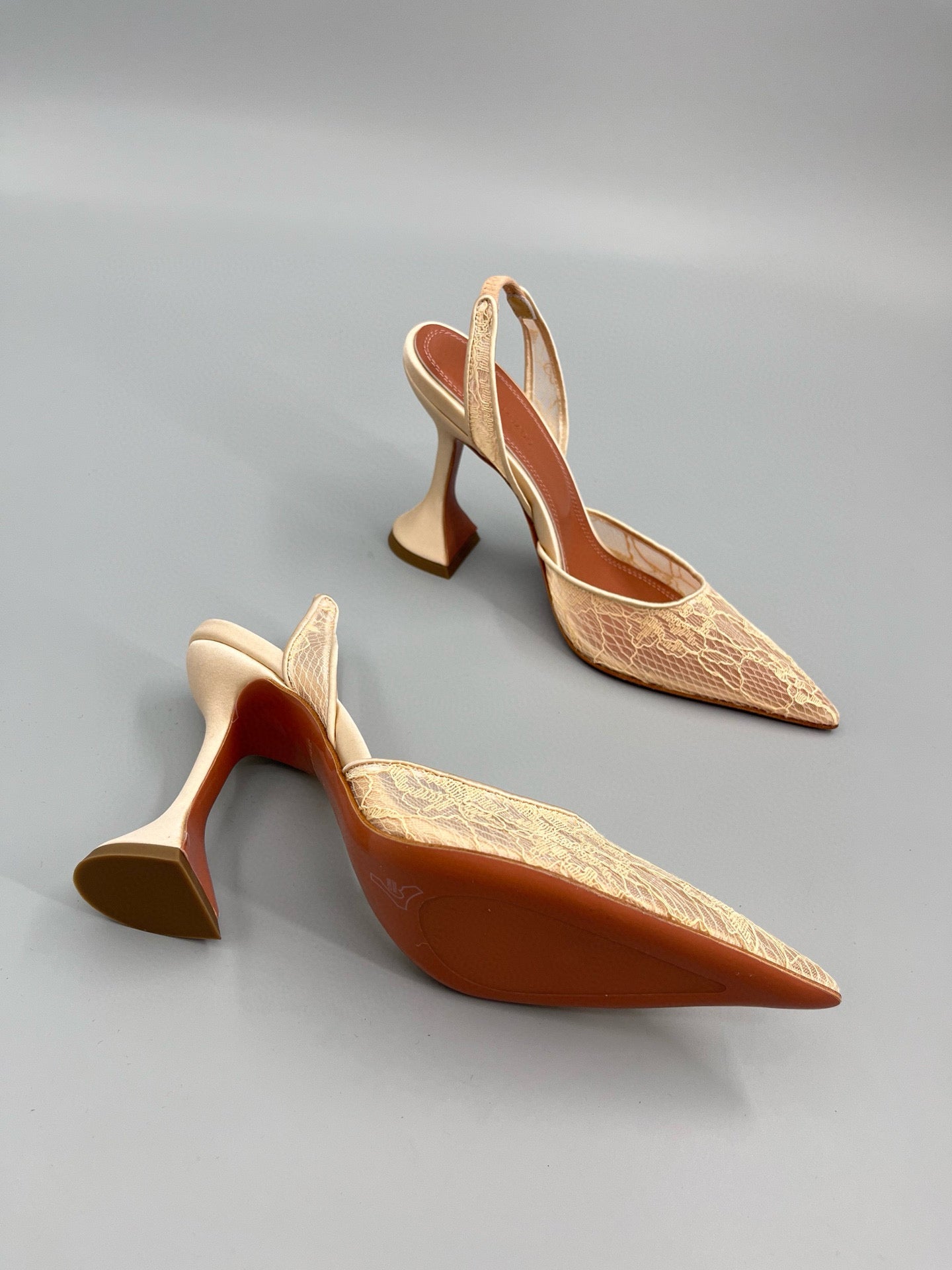 AMINA M HEELS