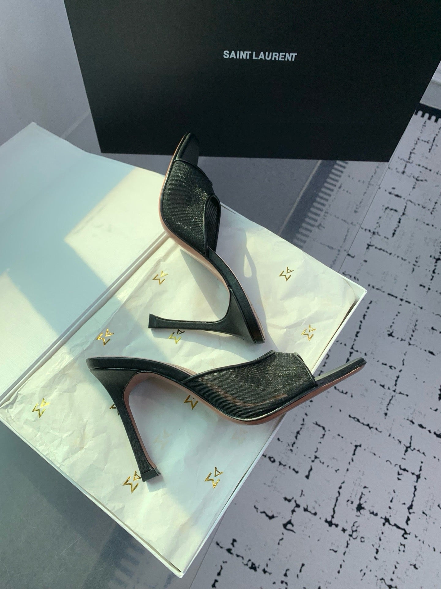 AMINA M HEELS