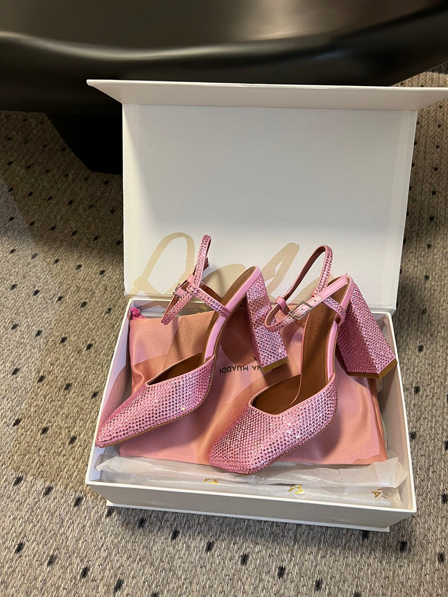 AMINA M HEELS