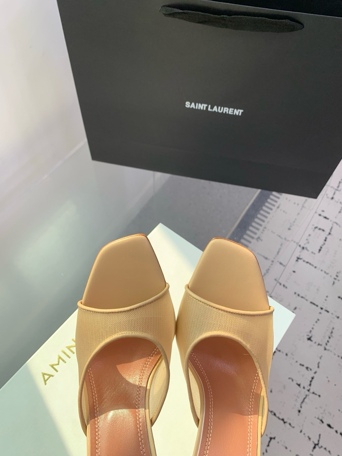 AMINA M HEELS
