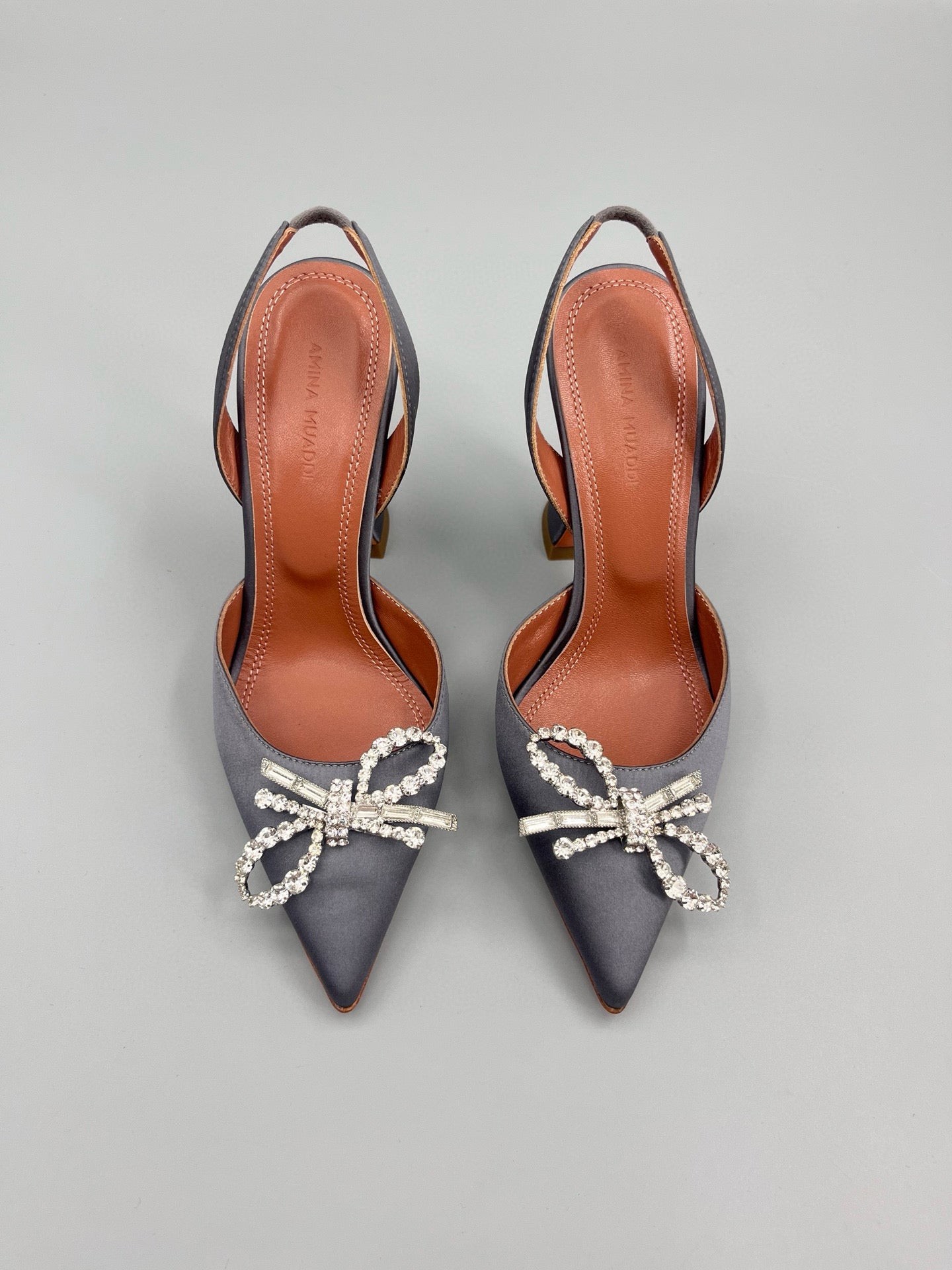 AMINA M HEELS