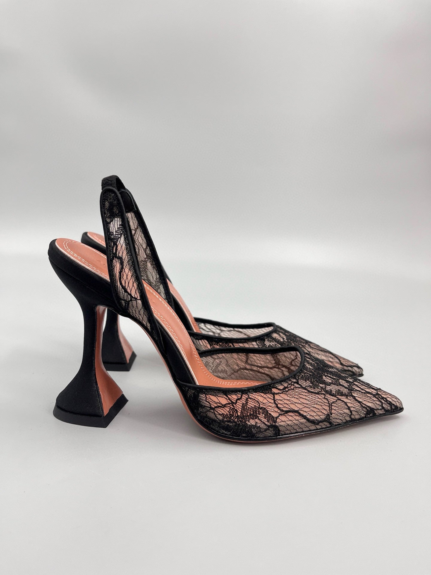 AMINA M HEELS