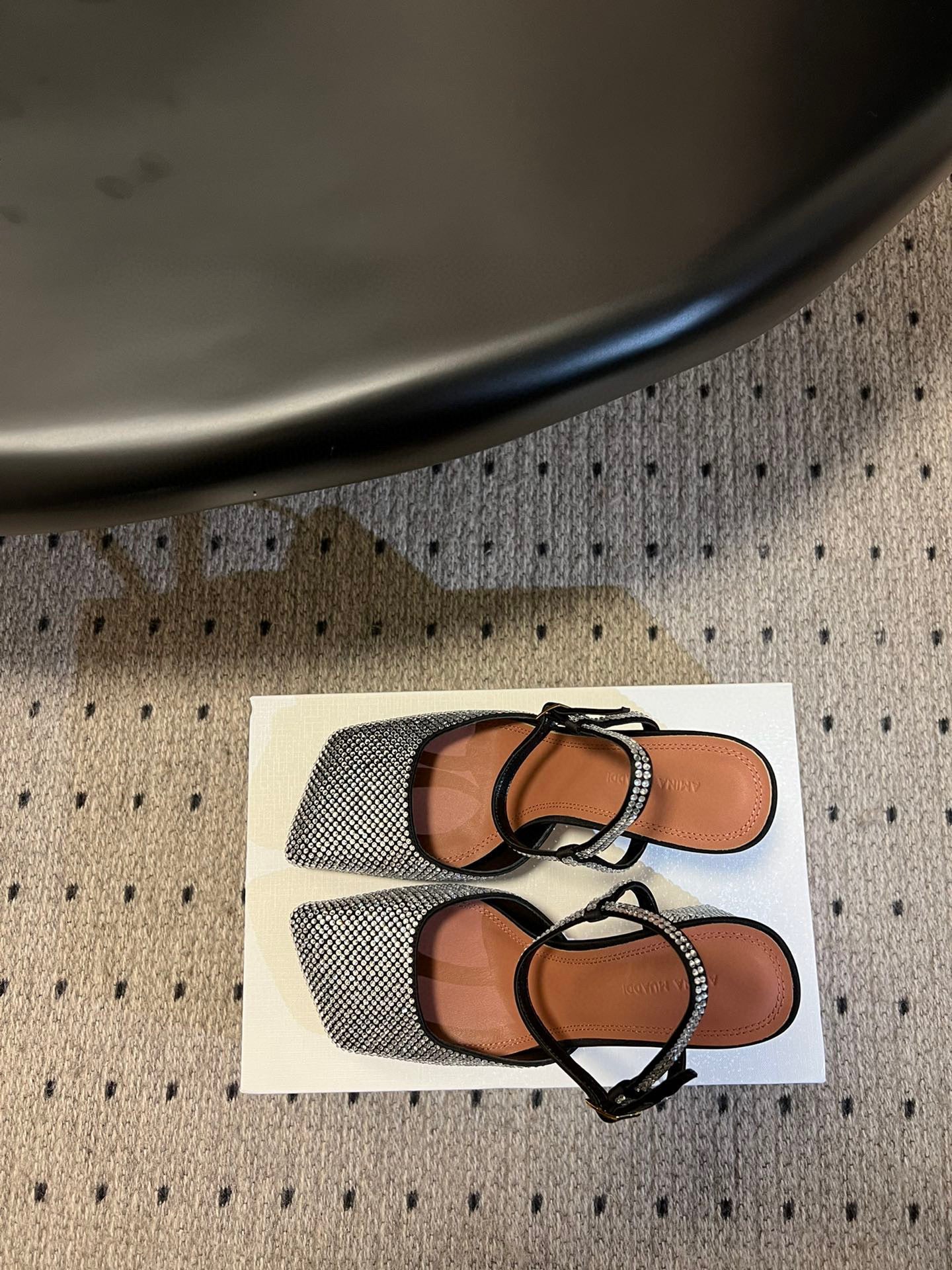 AMINA M HEELS