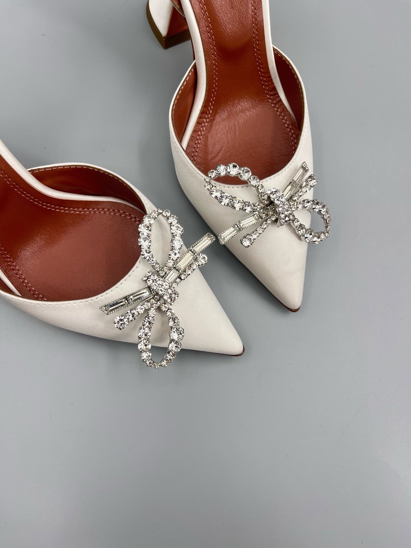 AMINA M HEELS